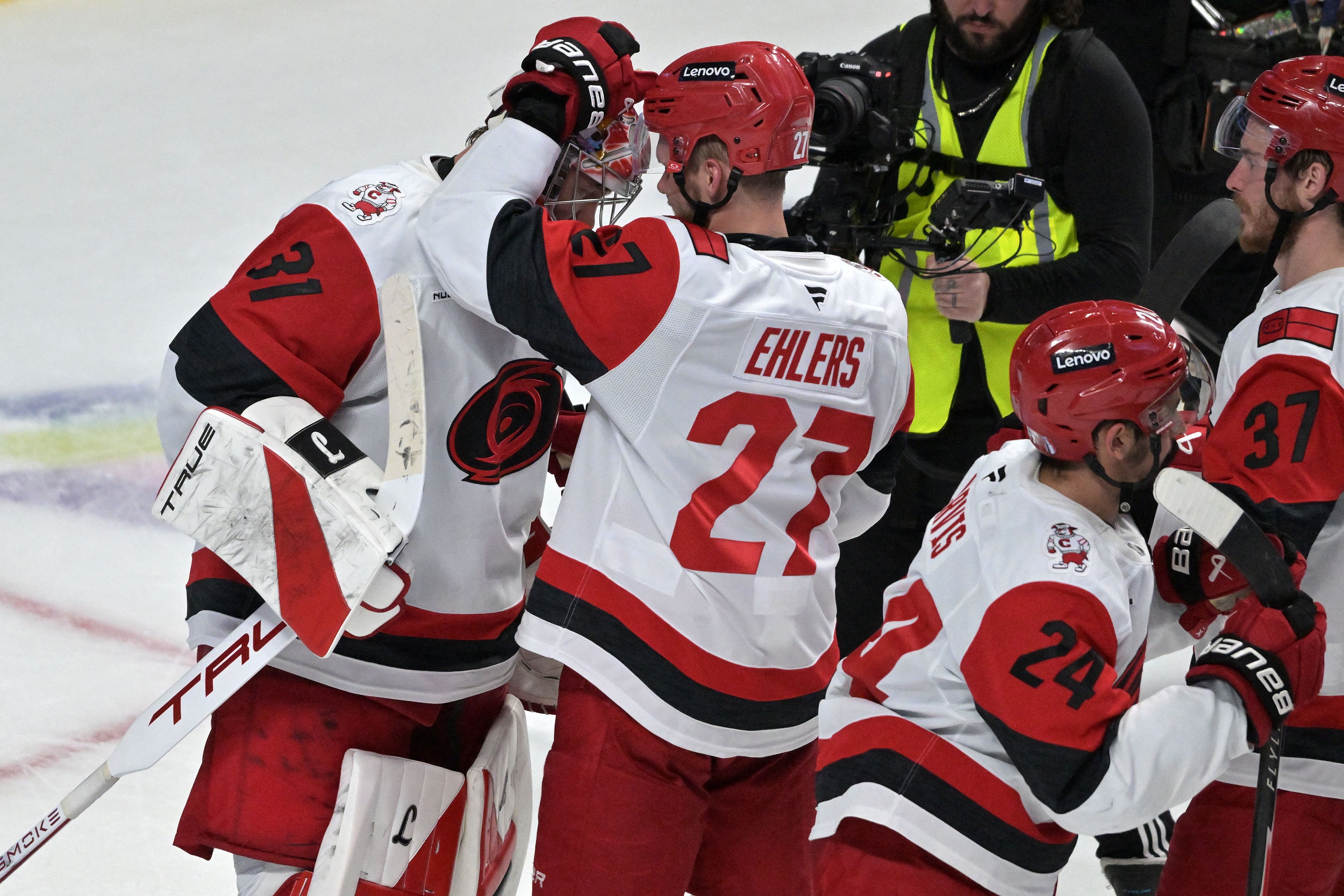 The Carolina Hurricanes celebrate their Game 4 victory over the Montreal Canadiens.