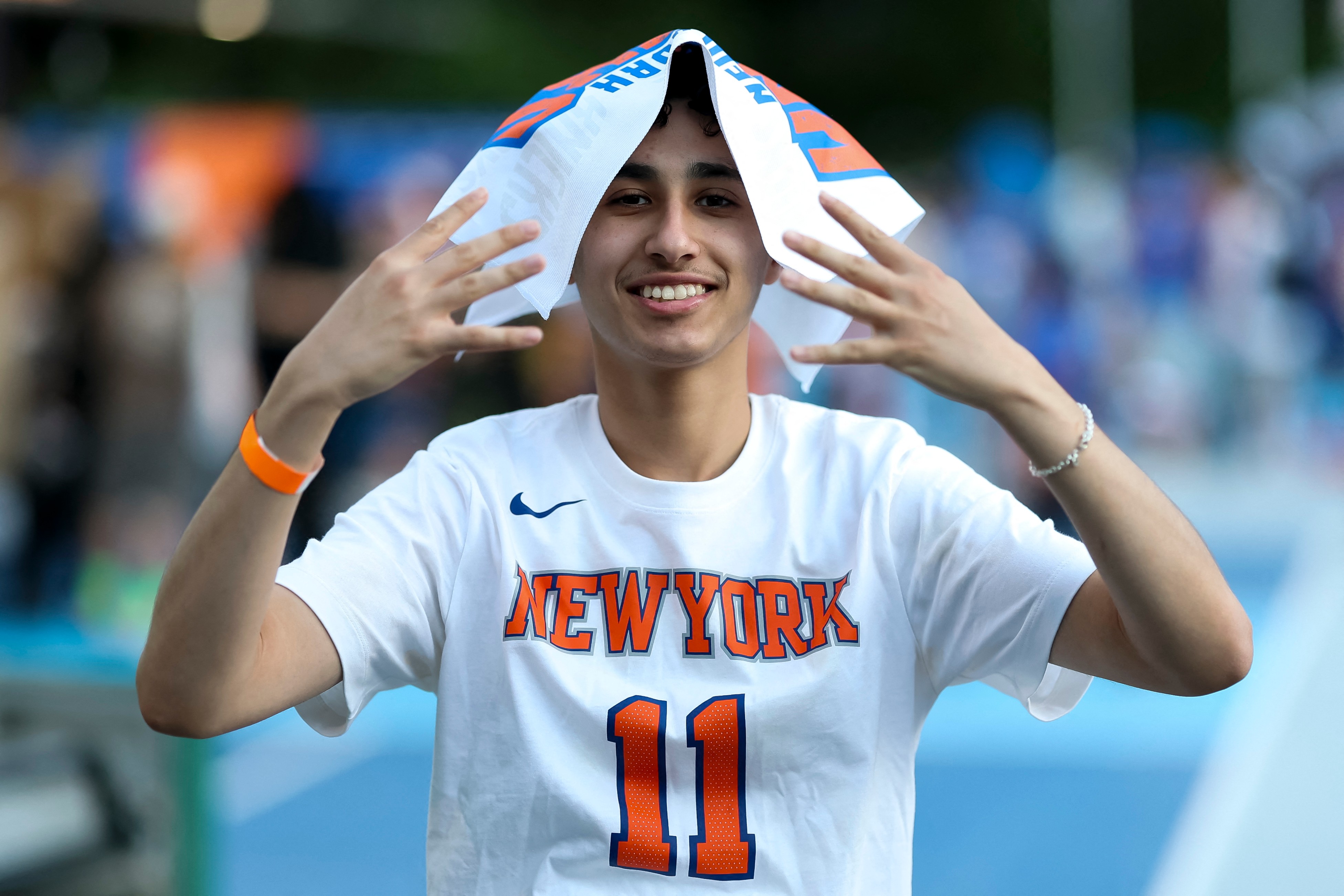 New York Knicks fan poses at an NBA Finals watch party 2026