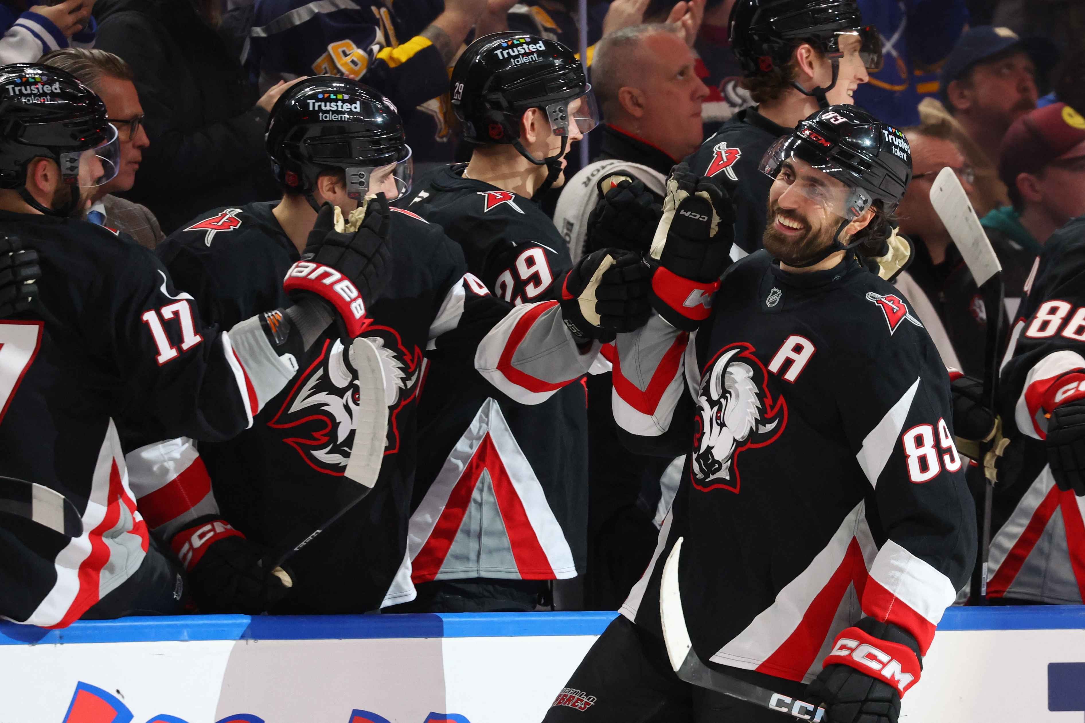 Buffalo Sabres forward Alex Tuch celebrates goal with teammates