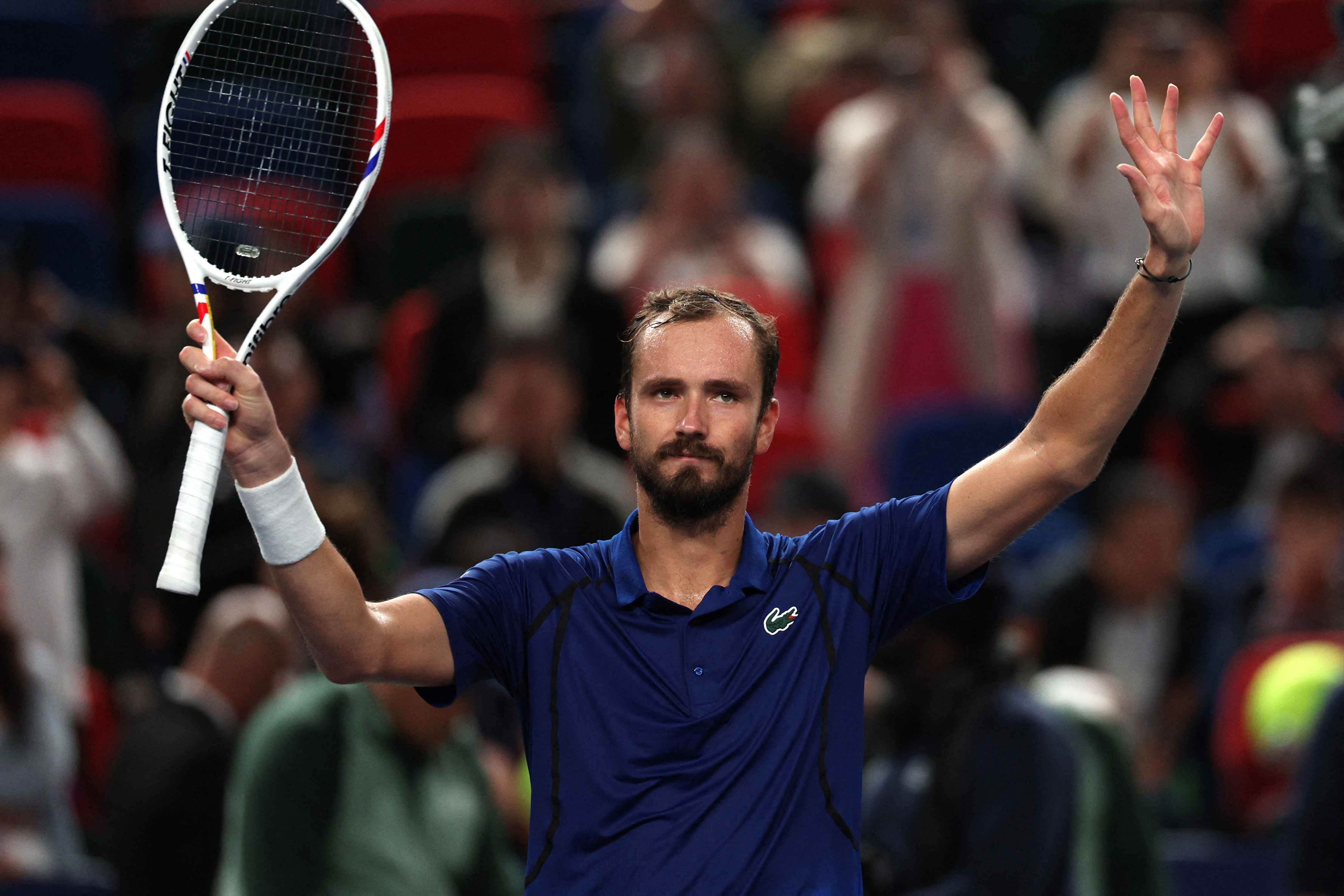Daniil Medvedev celebrates after winning his quarter-final against Tommy Paul