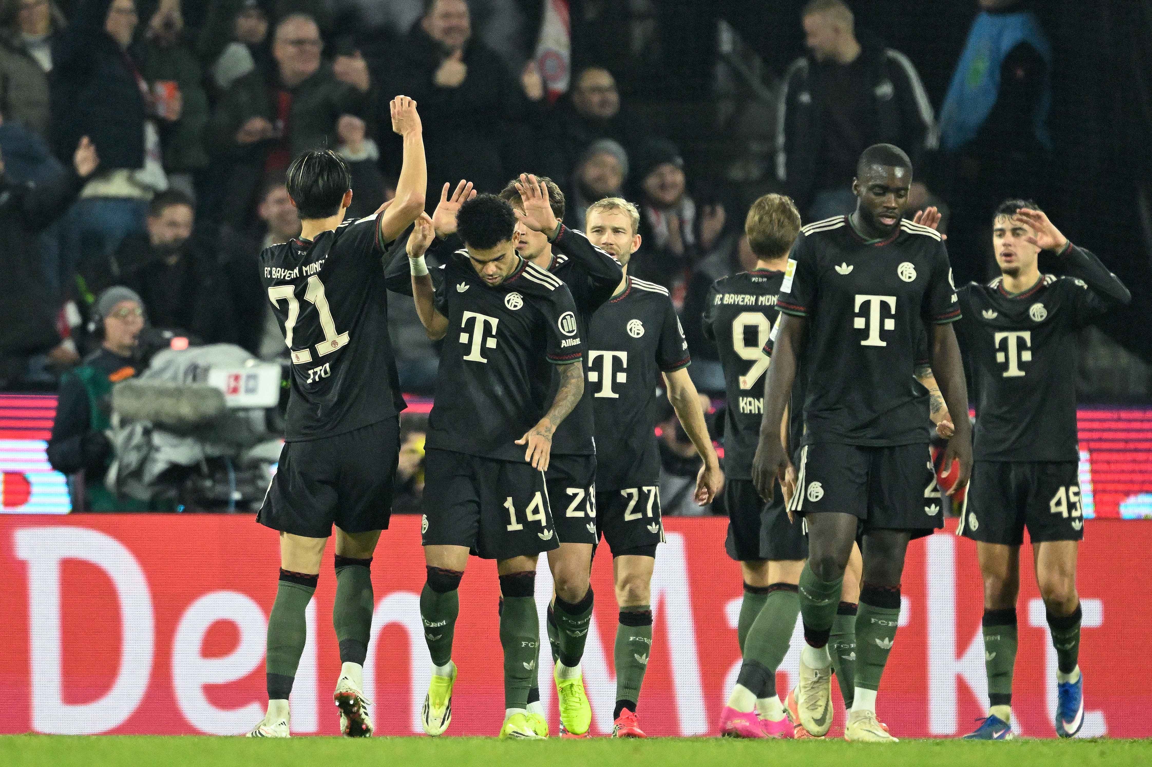 Bayern Munich celebrate one of their three goals on the night