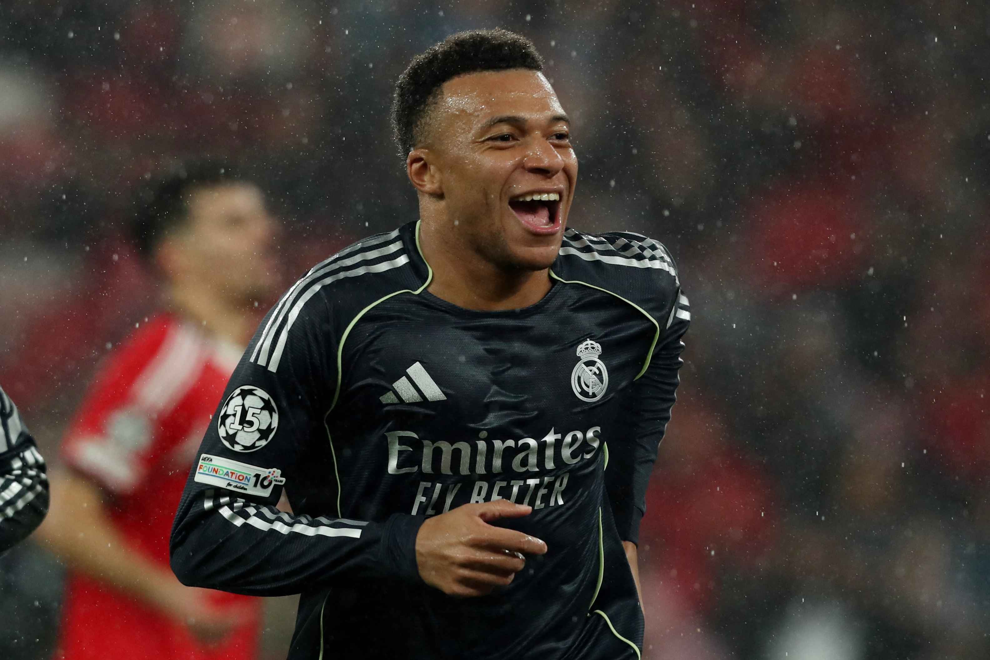 Kylian Mbappe celebrates one of his goals in Lisbon against Benfica