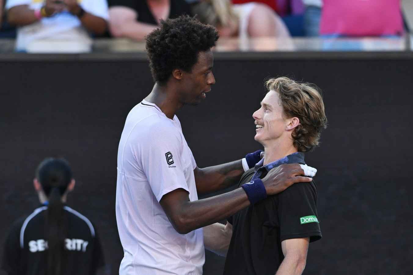 Monfils and Sweeny embrace after the match