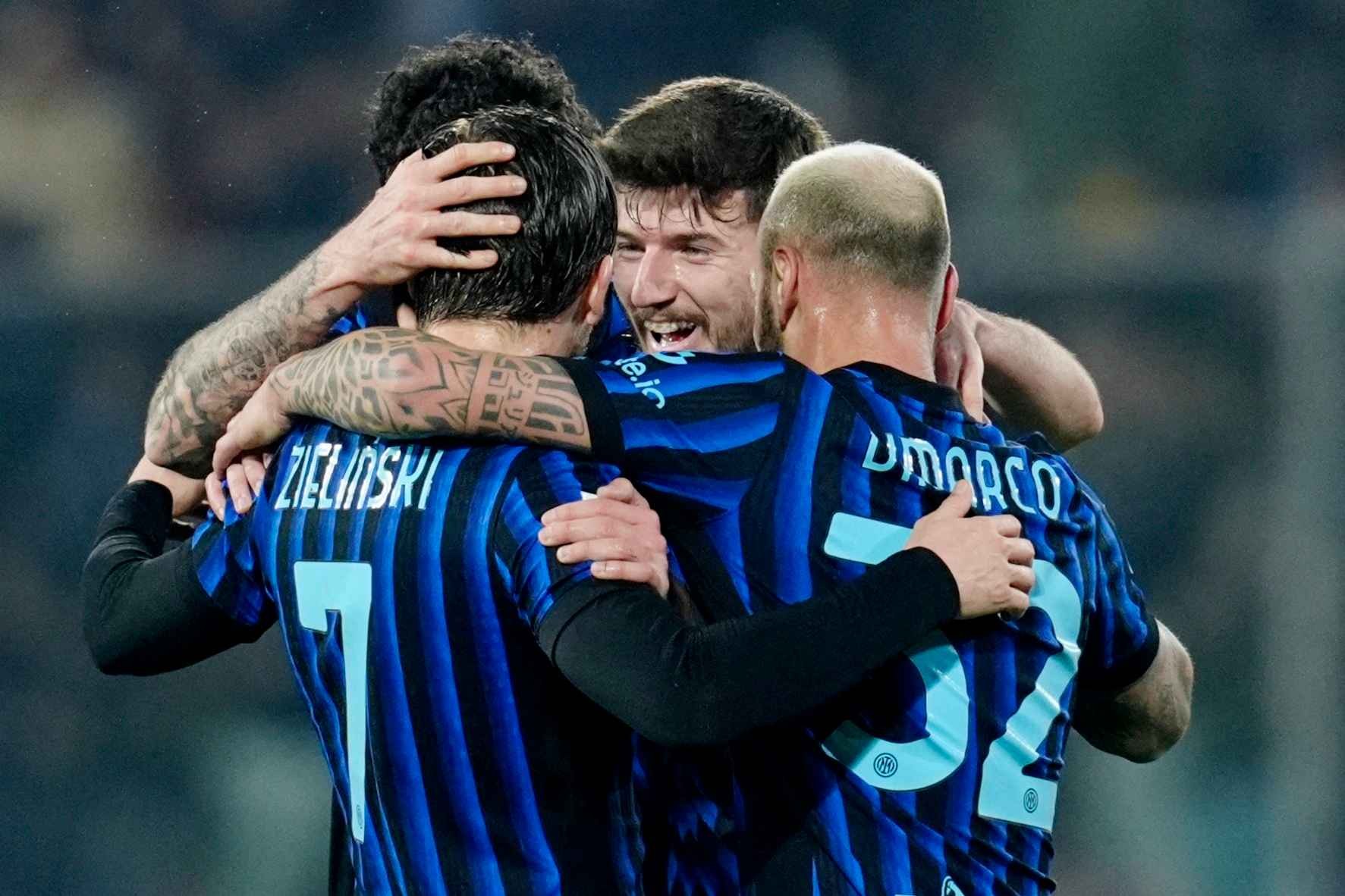 Inter Milan's Piotr Zielinski celebrates scoring their second goal with Federico Dimarco