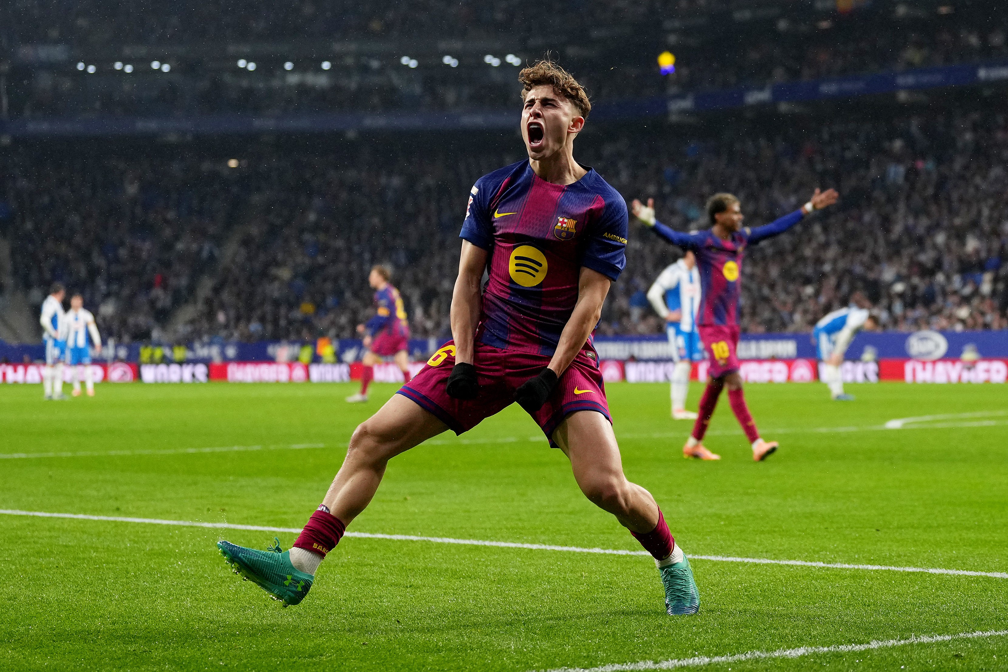 Fermin Lopez of FC Barcelona celebrates his team's first goal against Espanyol