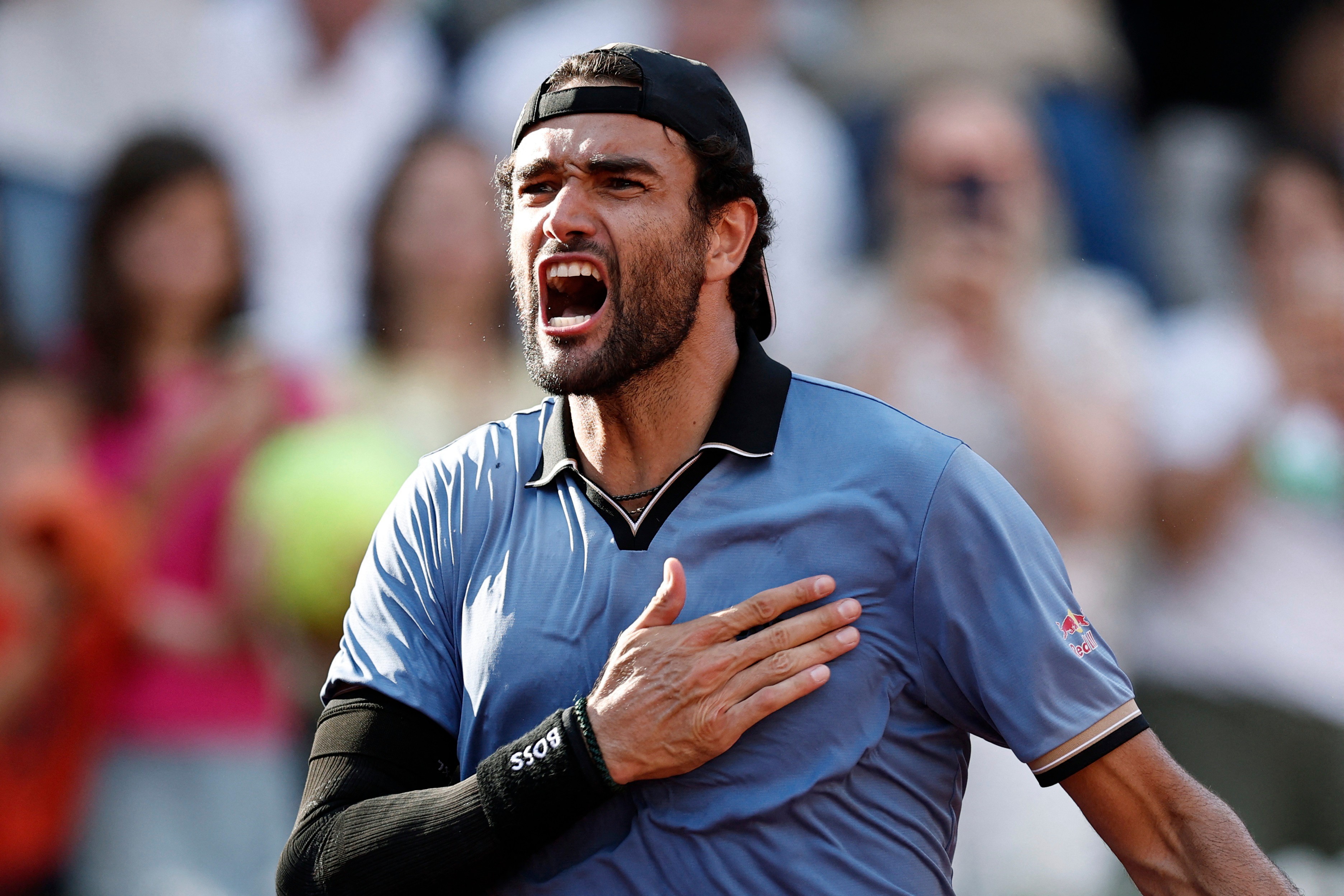 Matteo Berrettini celebrates his win