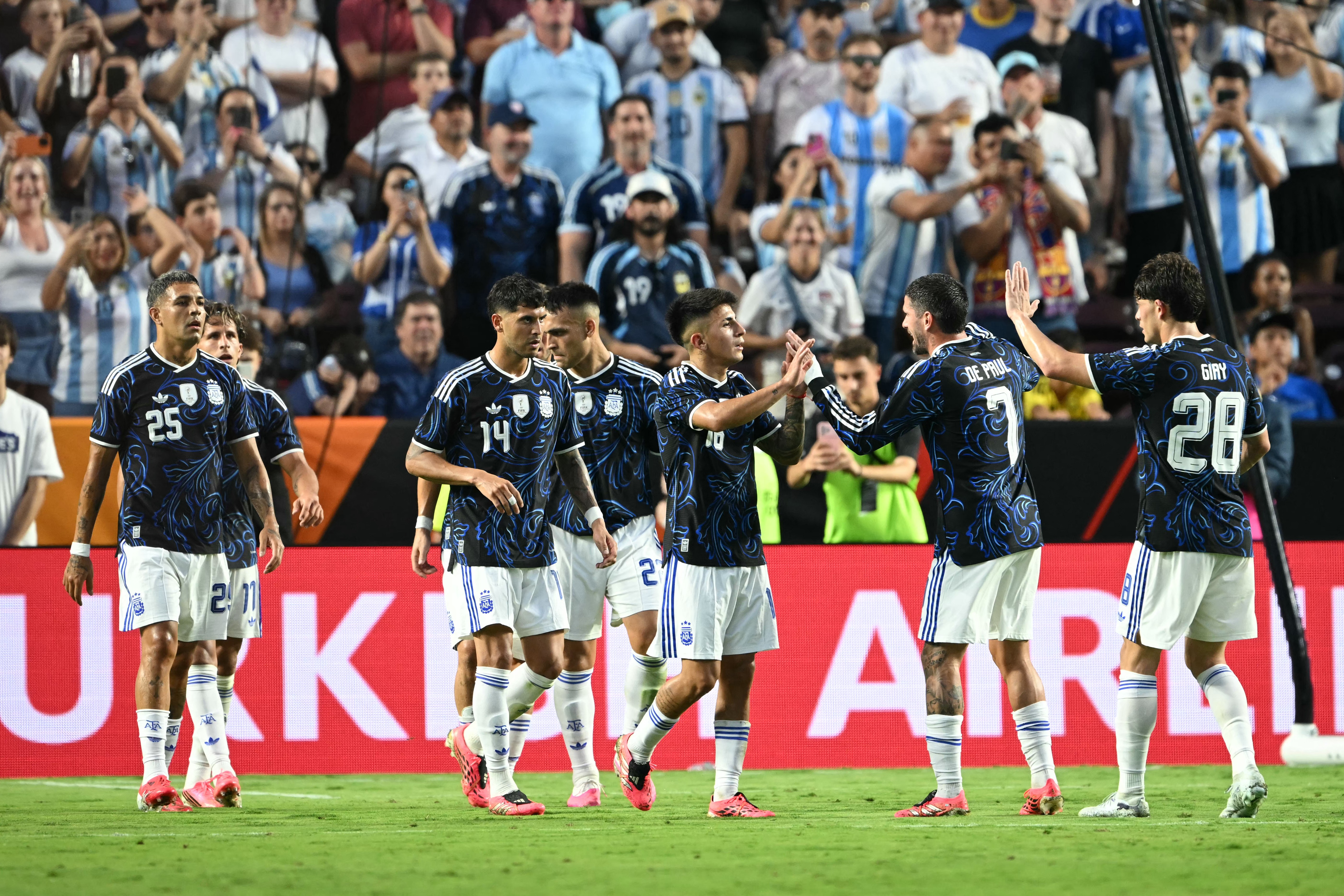 Argentina celebrate one of their goals in their win over Honduras.