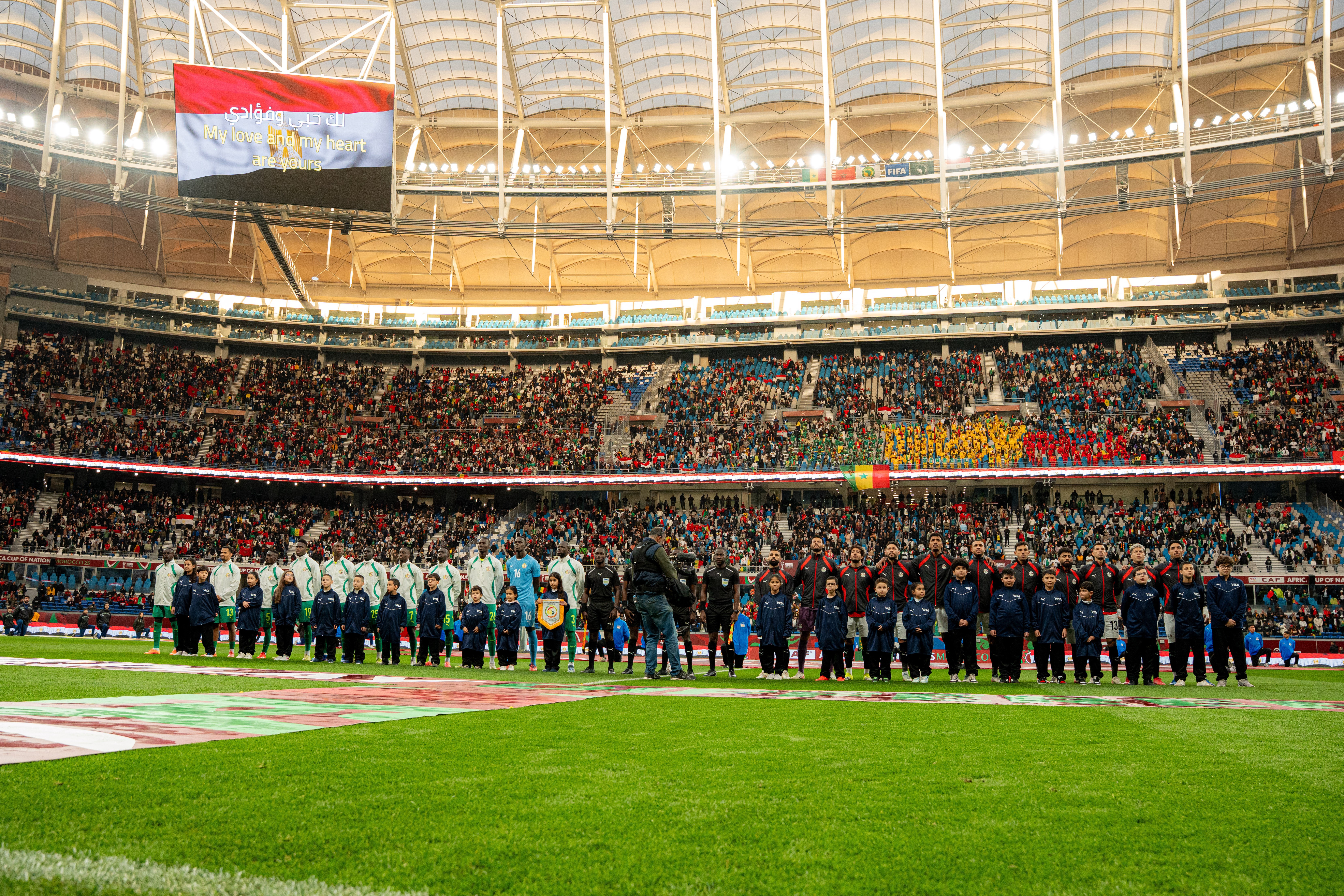Senegal and Egypt line up before their semi-final on Wednesday