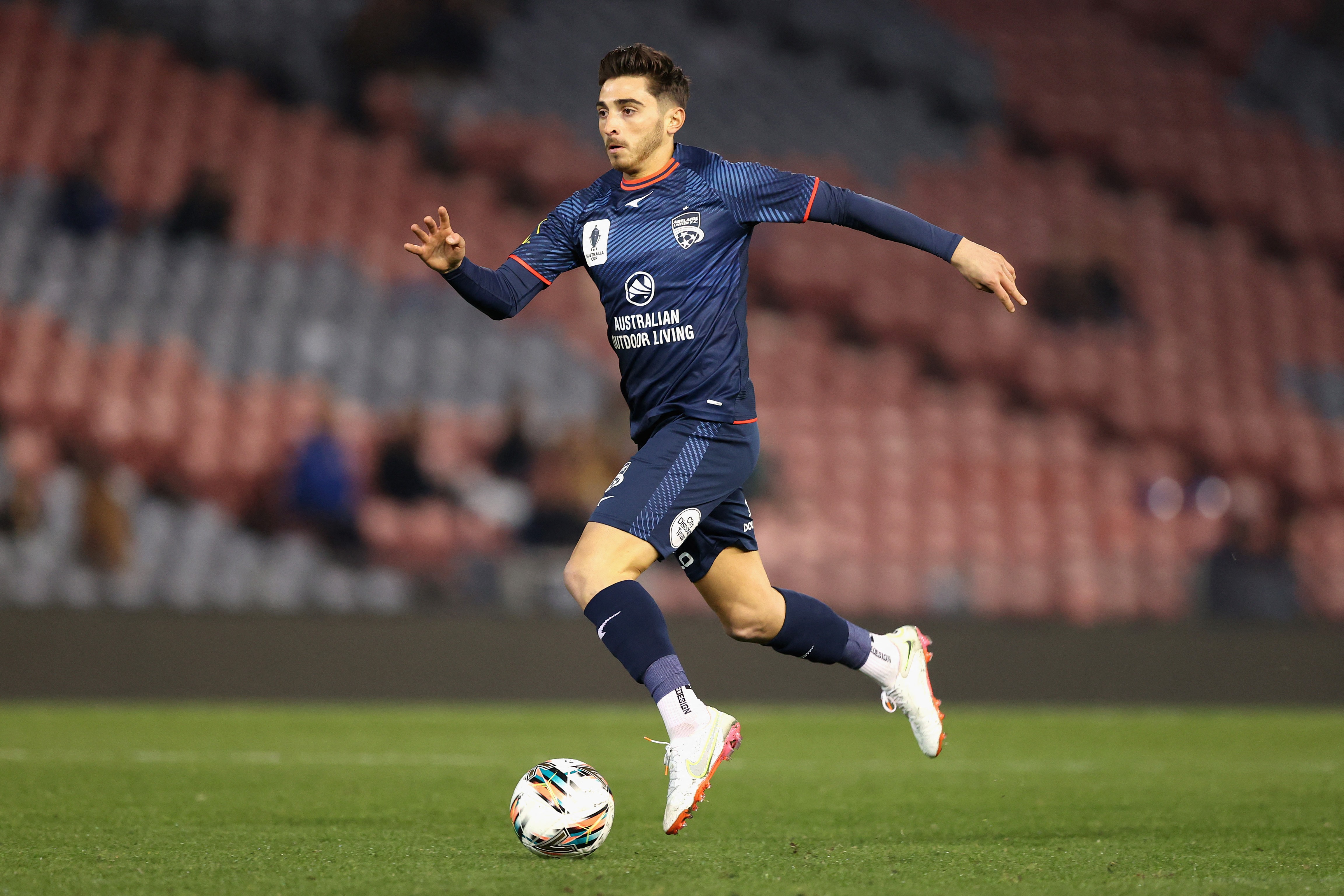 Josh Cavallo in action for Adelaide United.