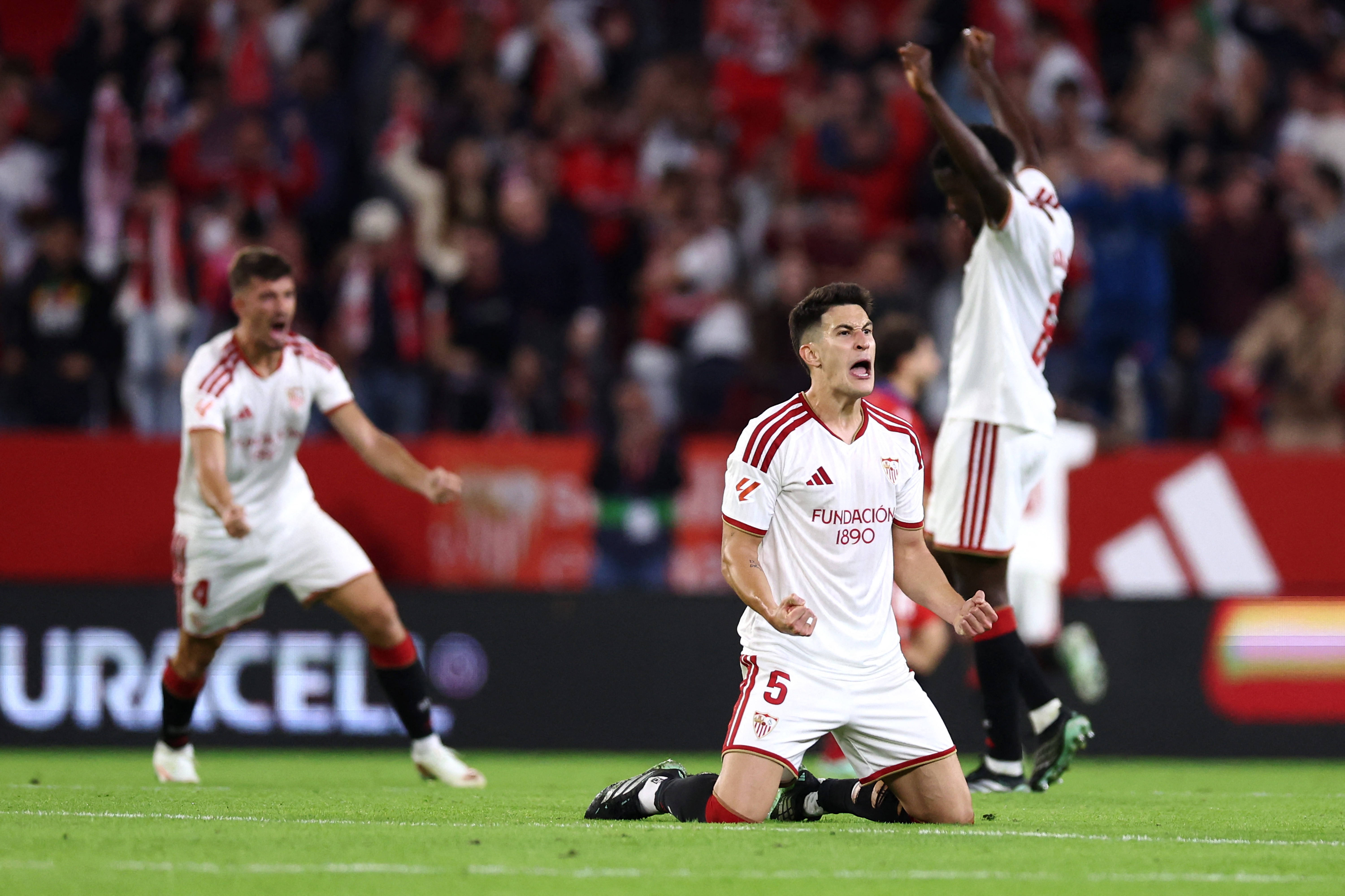 Sevilla players celebrate goal