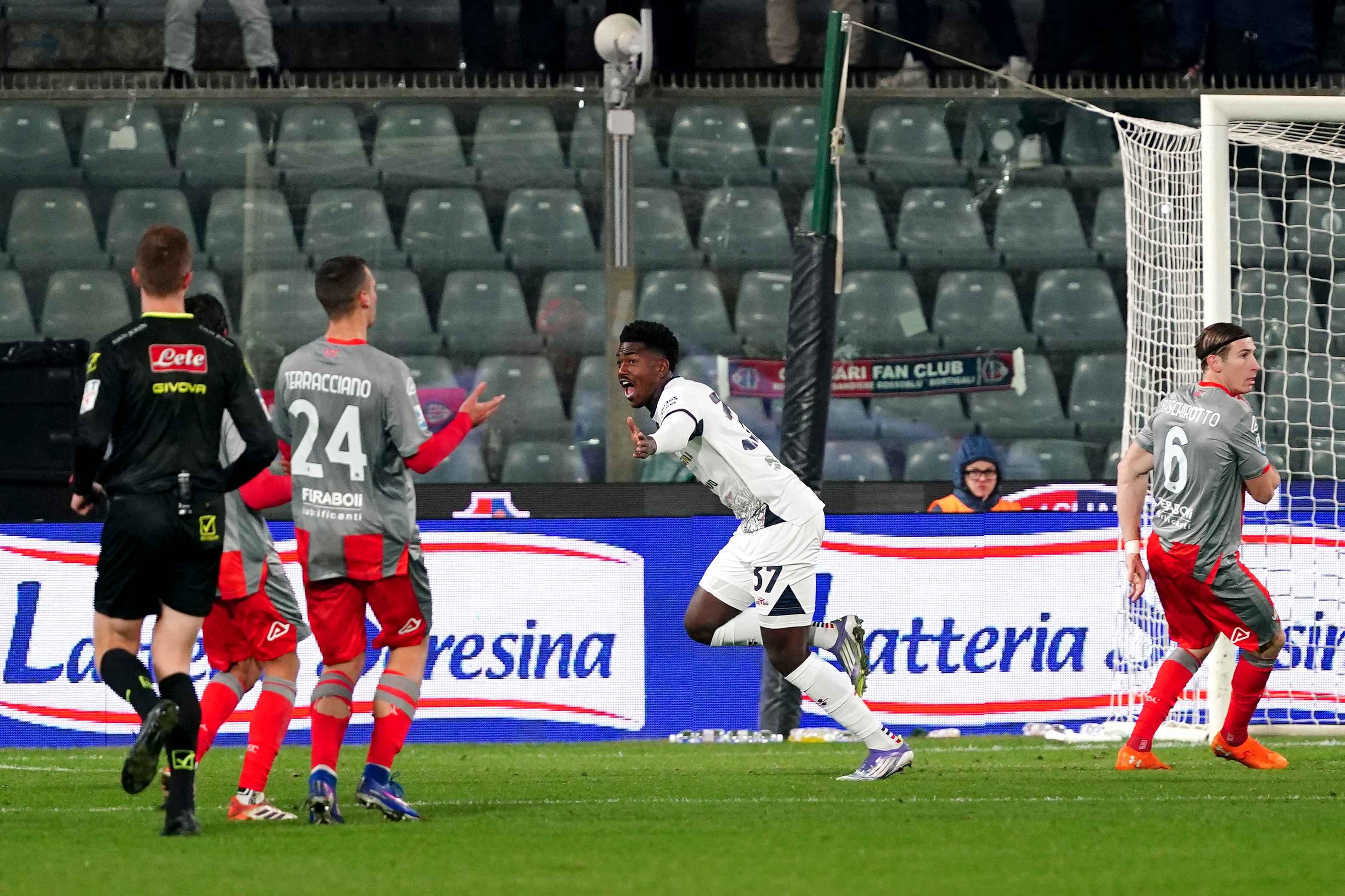 Yael Trepy of Cagliari celebrates scoring his team's late equaliser
