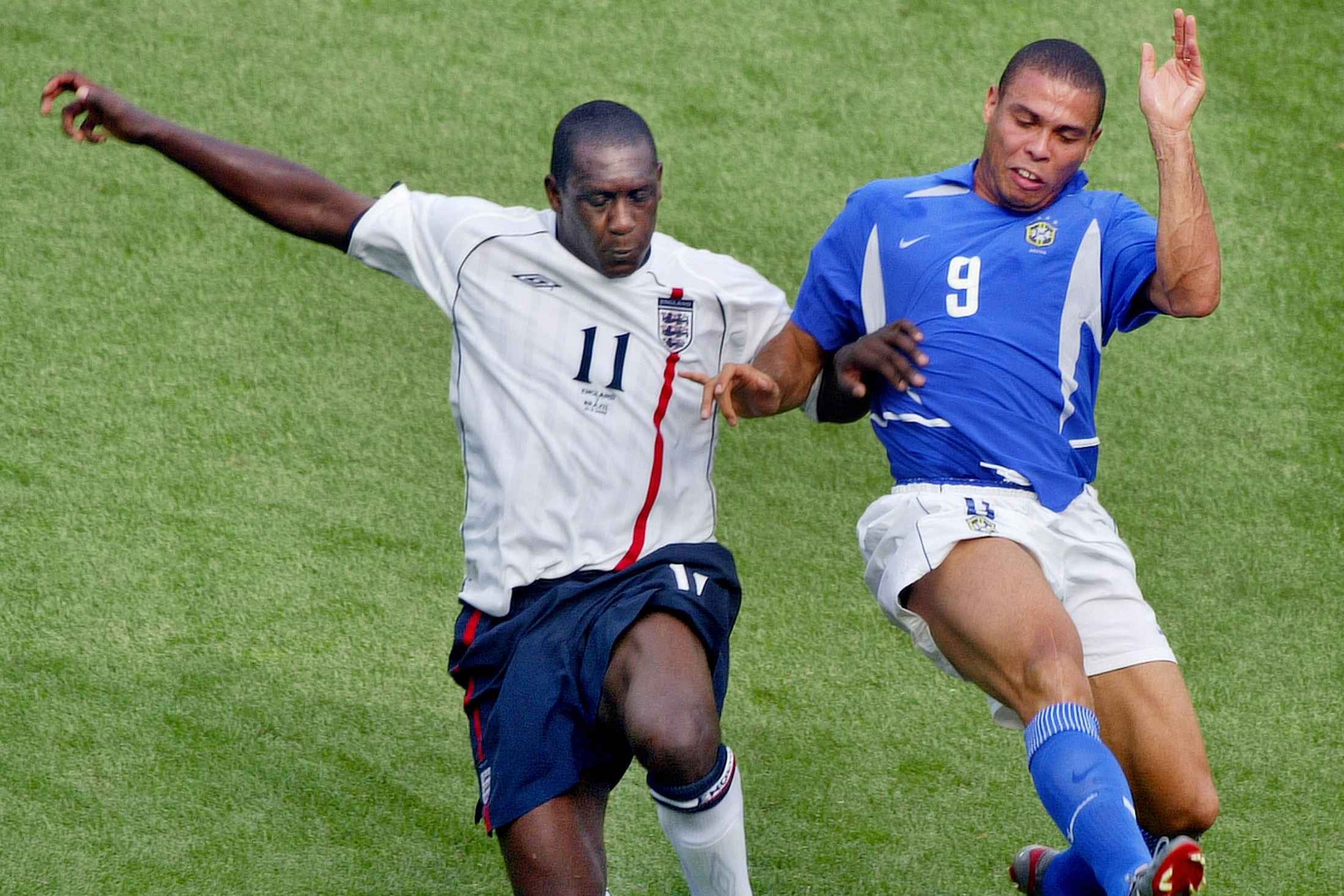 Emile Heskey and Ronaldo during the 2002 World Cup quarter-final between England and Brazil