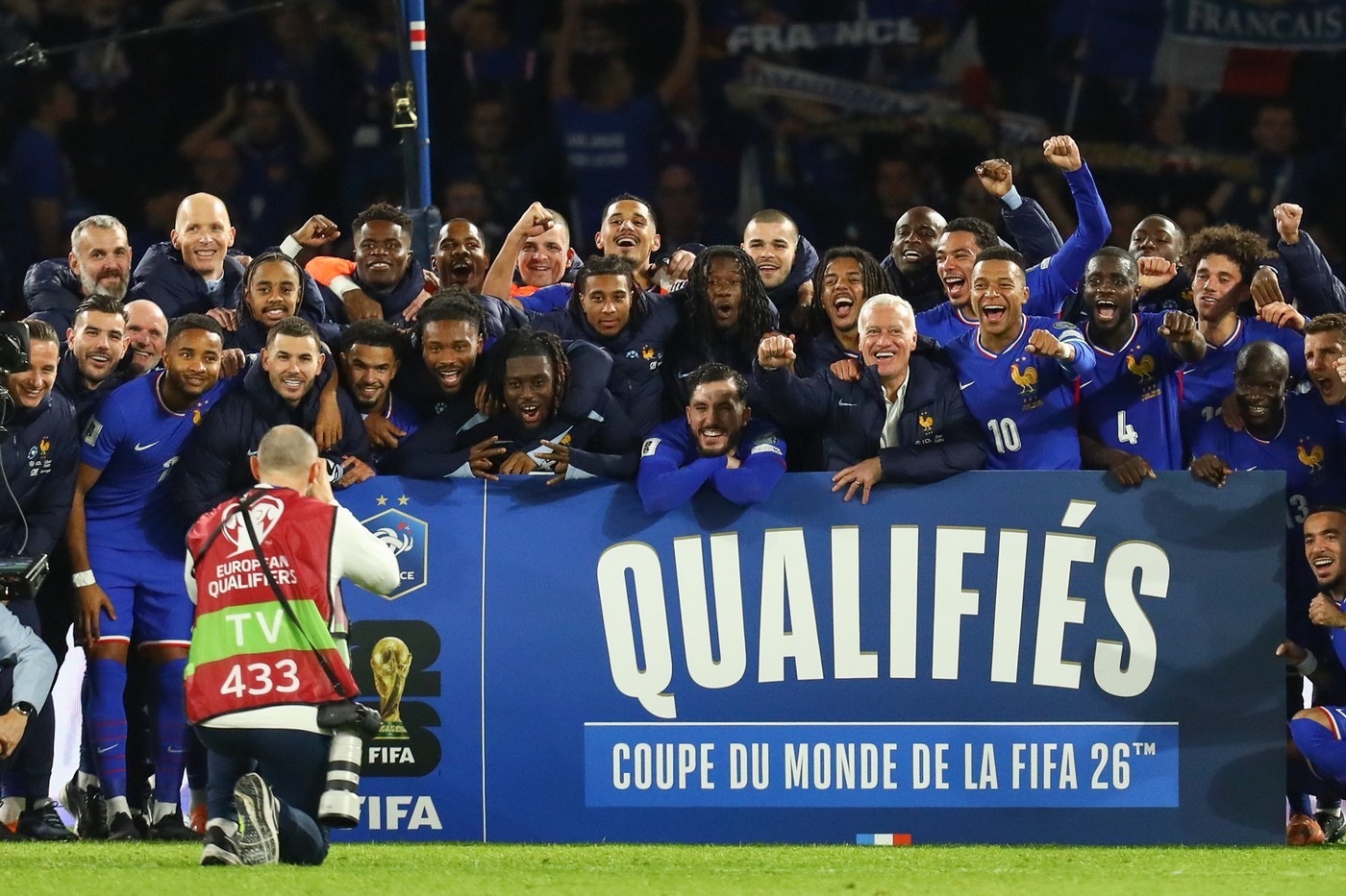 The French national team led by head coach Didier Deschamps and captain Kylian Mbappe' celebrate their qualification for the World Cup