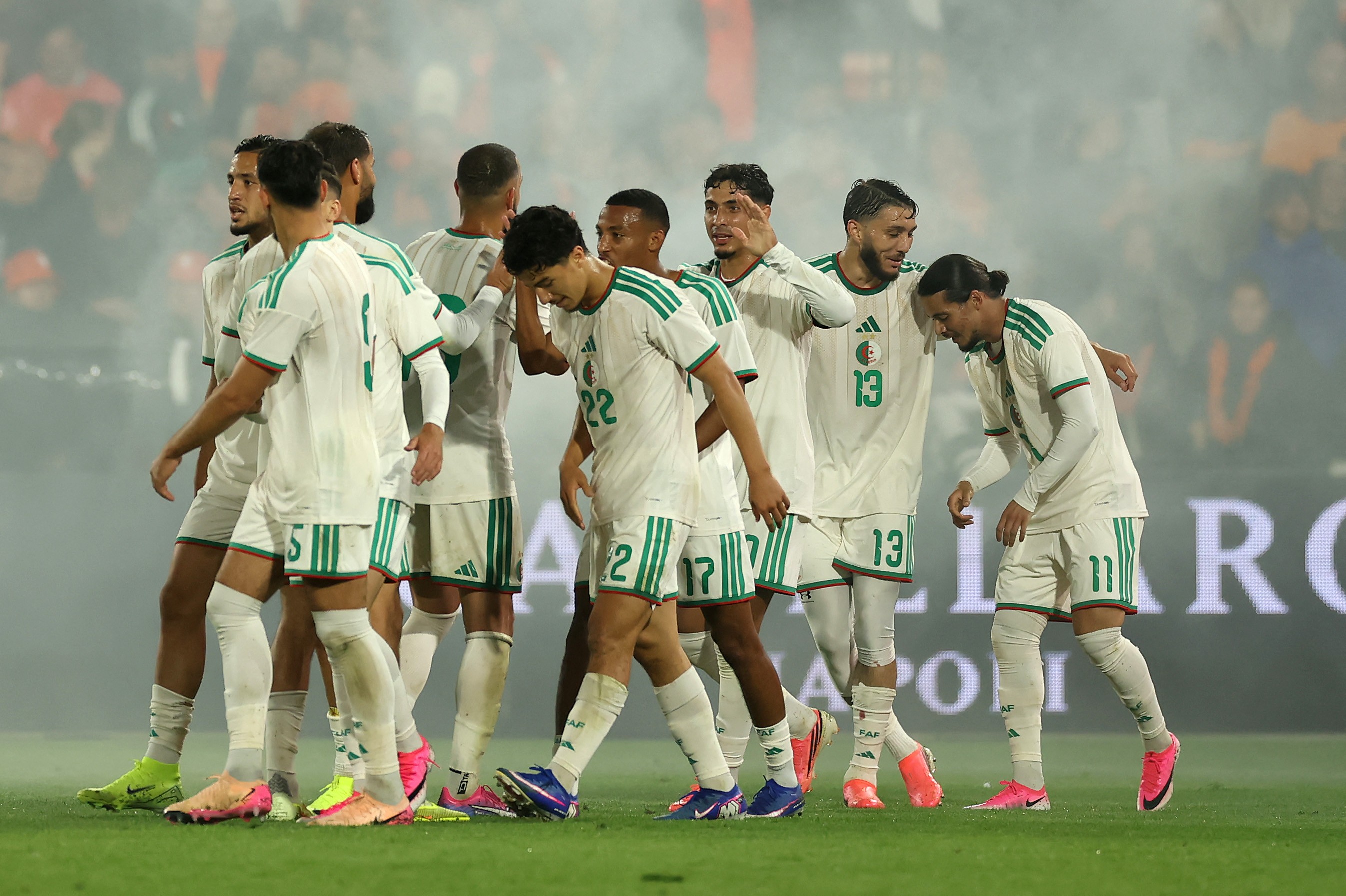 Algeria celebrate Anis Hadj Moussa's (R) 1-0 against the Netherlands