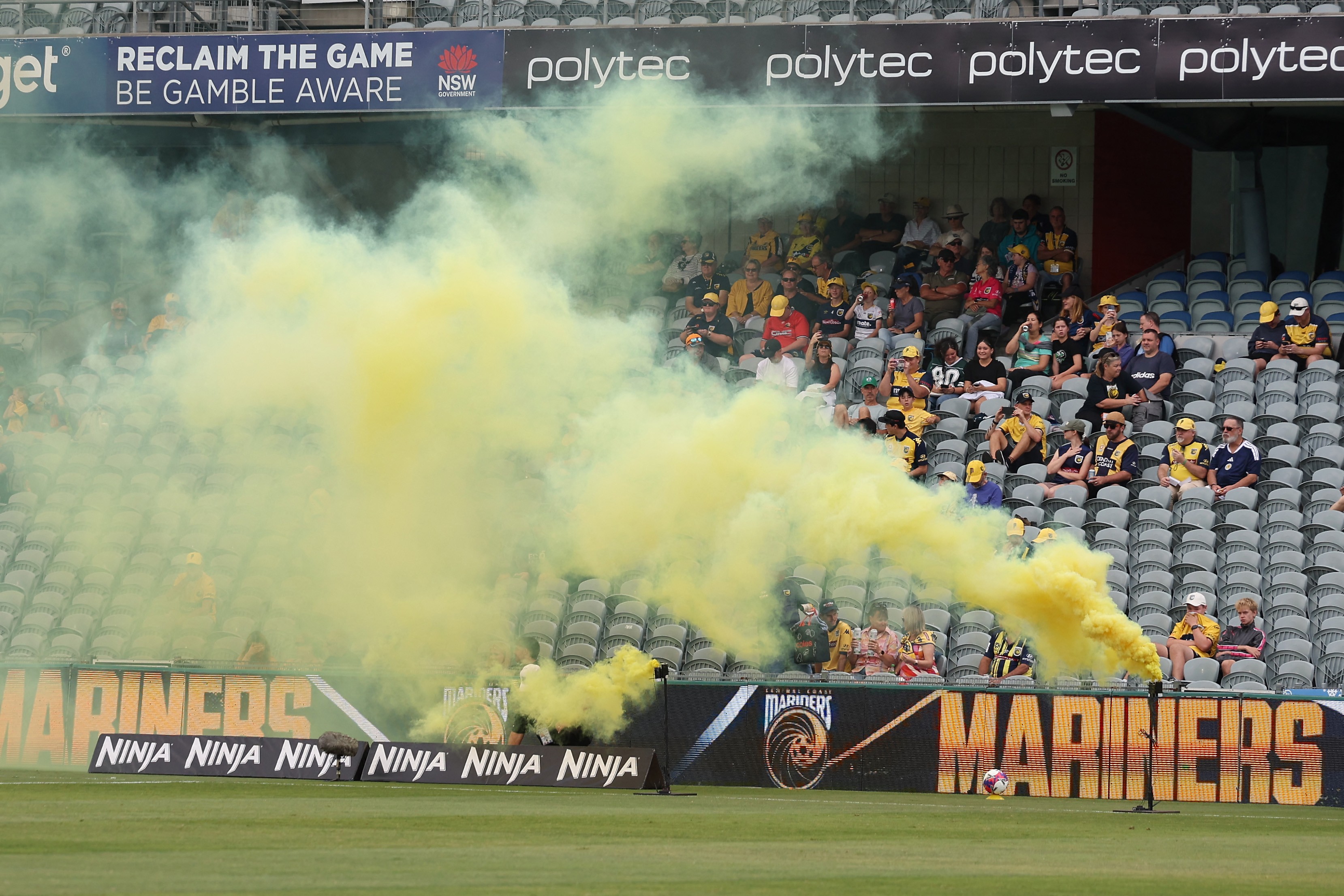 Pyrotechnics are let off before a Ninja A-League game at Polytec Stadium in Gosford.