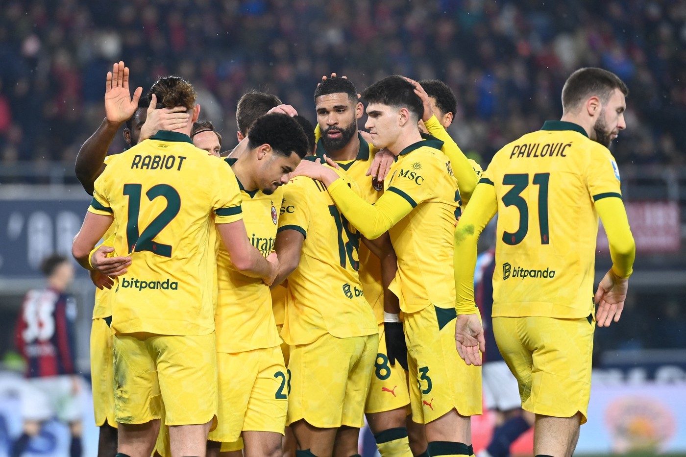 AC Milan celebrate against Bologna