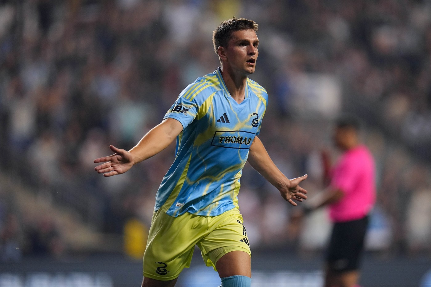 Mikael Uhre celebrates a goal during the second half of an MLS match against the Colorado Rapids