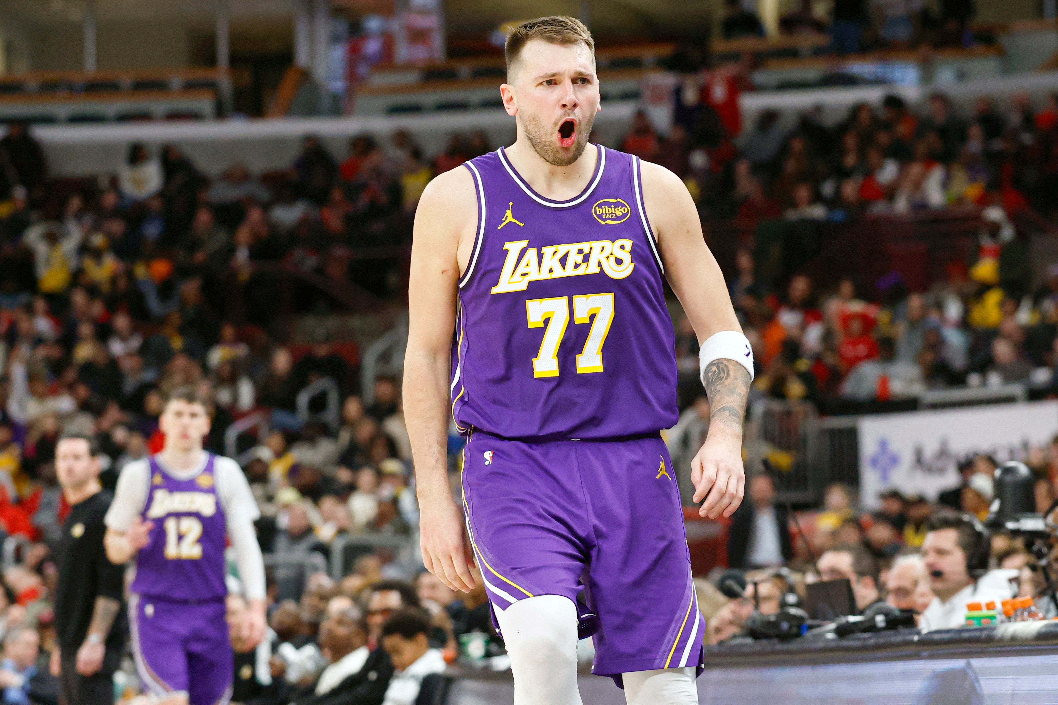Los Angeles Lakers guard Luka Doncic reacts after scoring against the Chicago Bulls