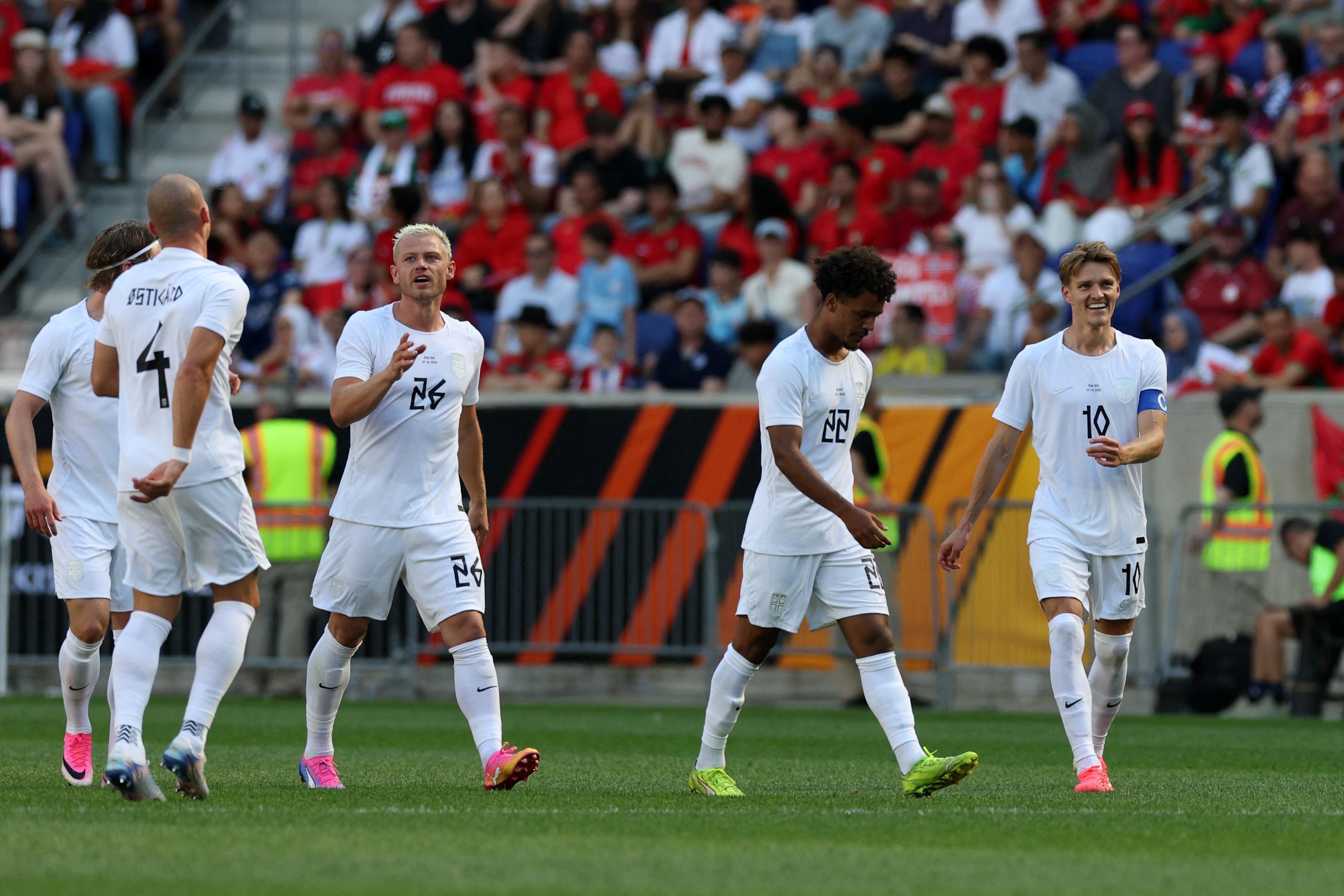 Odegaard (right) was on target for Norway