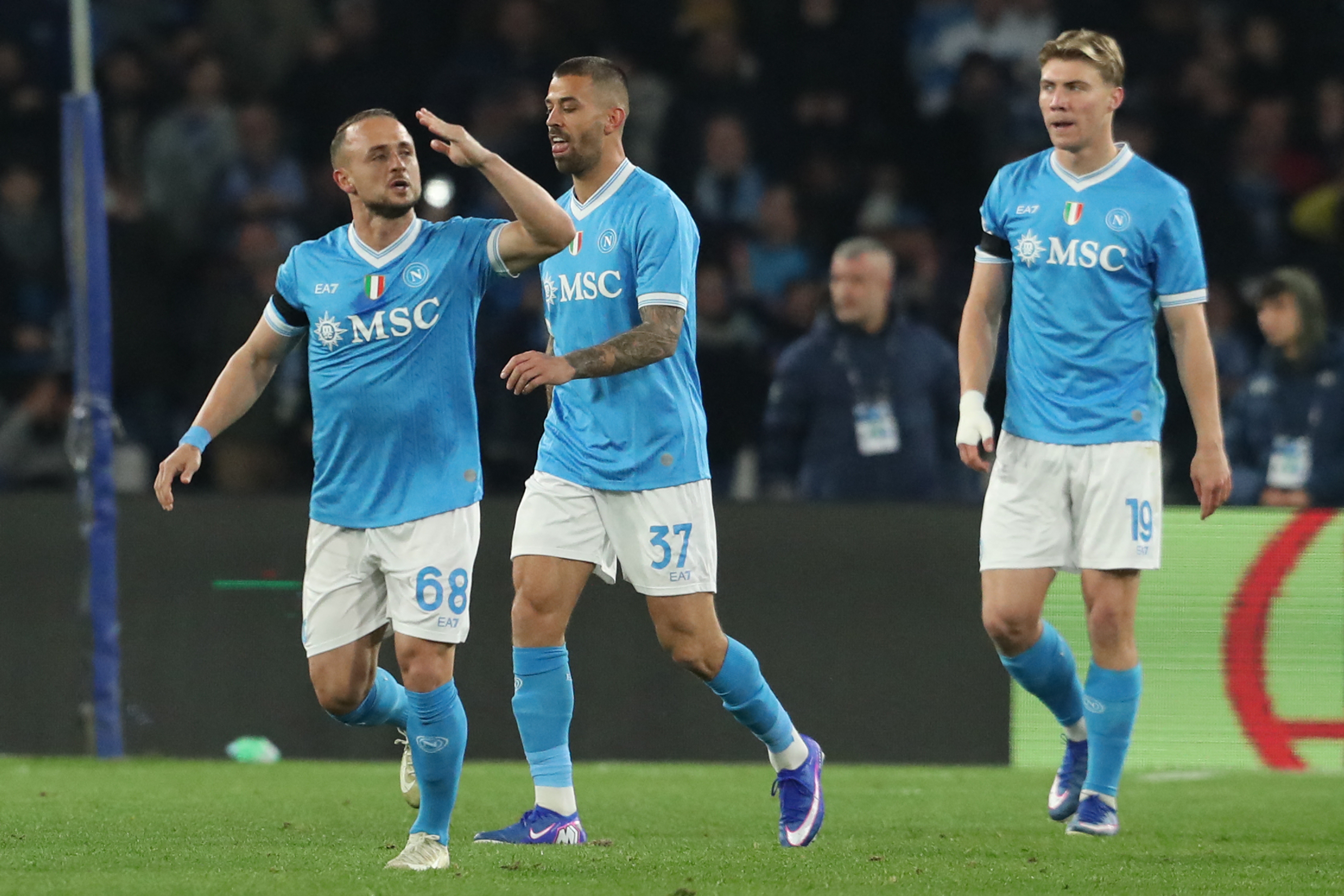 Lobotka (left) celebrates scoring for Napoli
