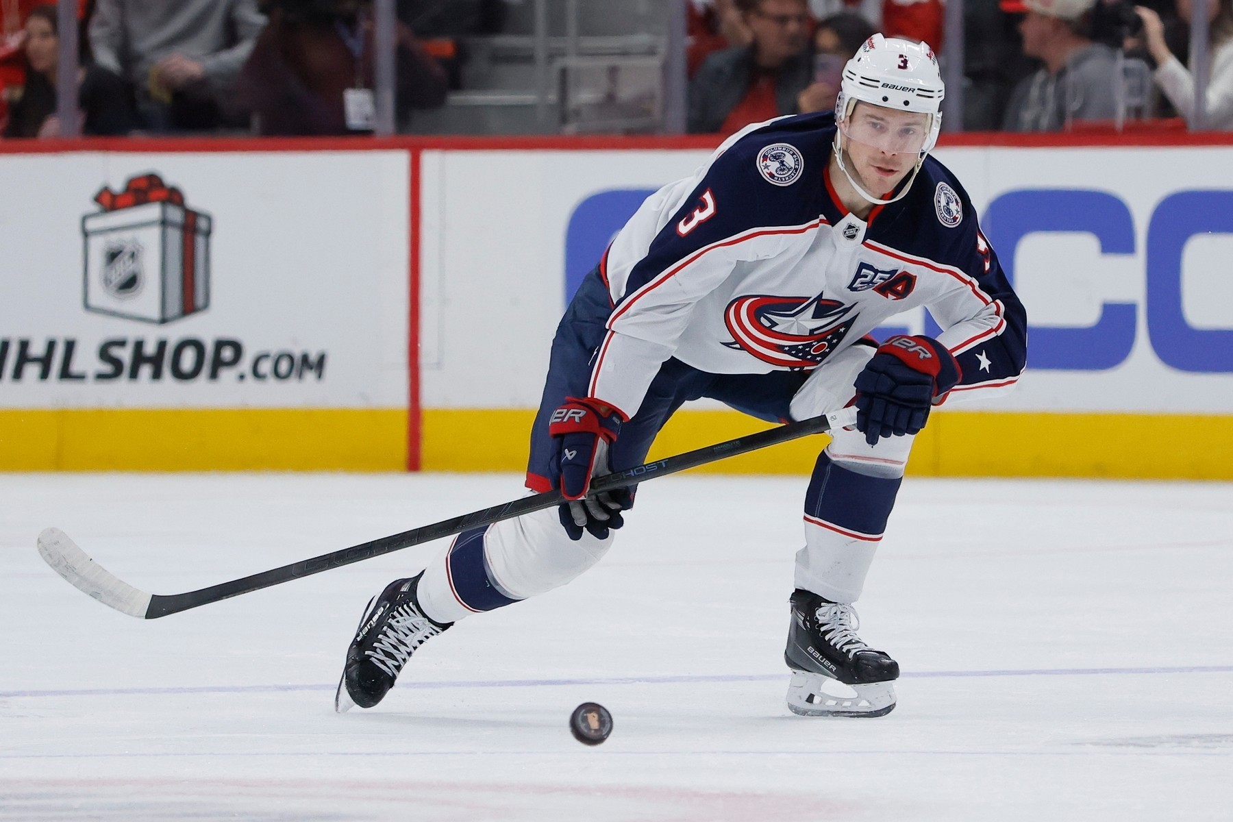 Blue Jackets forward Charlie Coyle moving the puck during a game