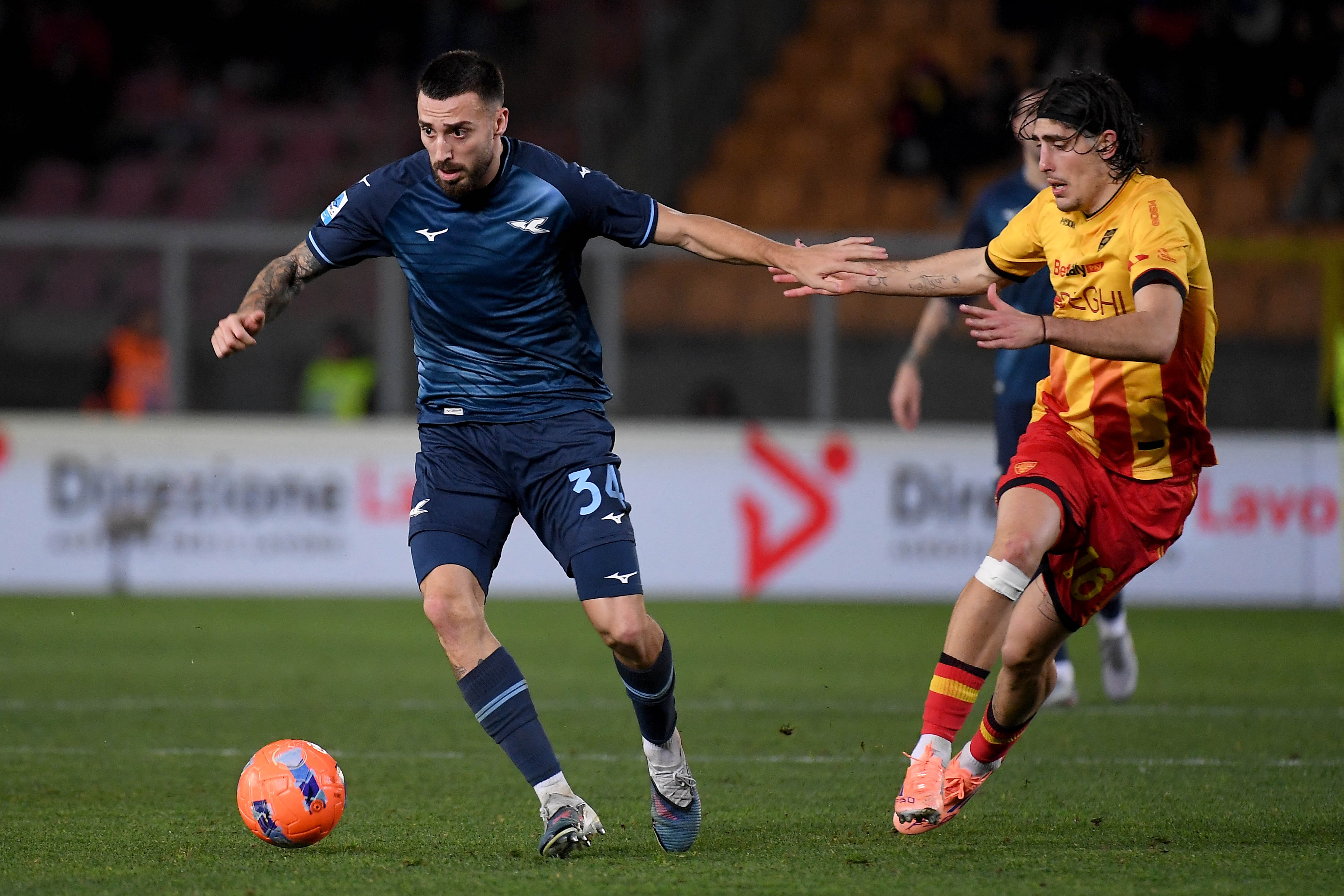 Mario Gila of Lazio compete for the ball with Omri Gandelman