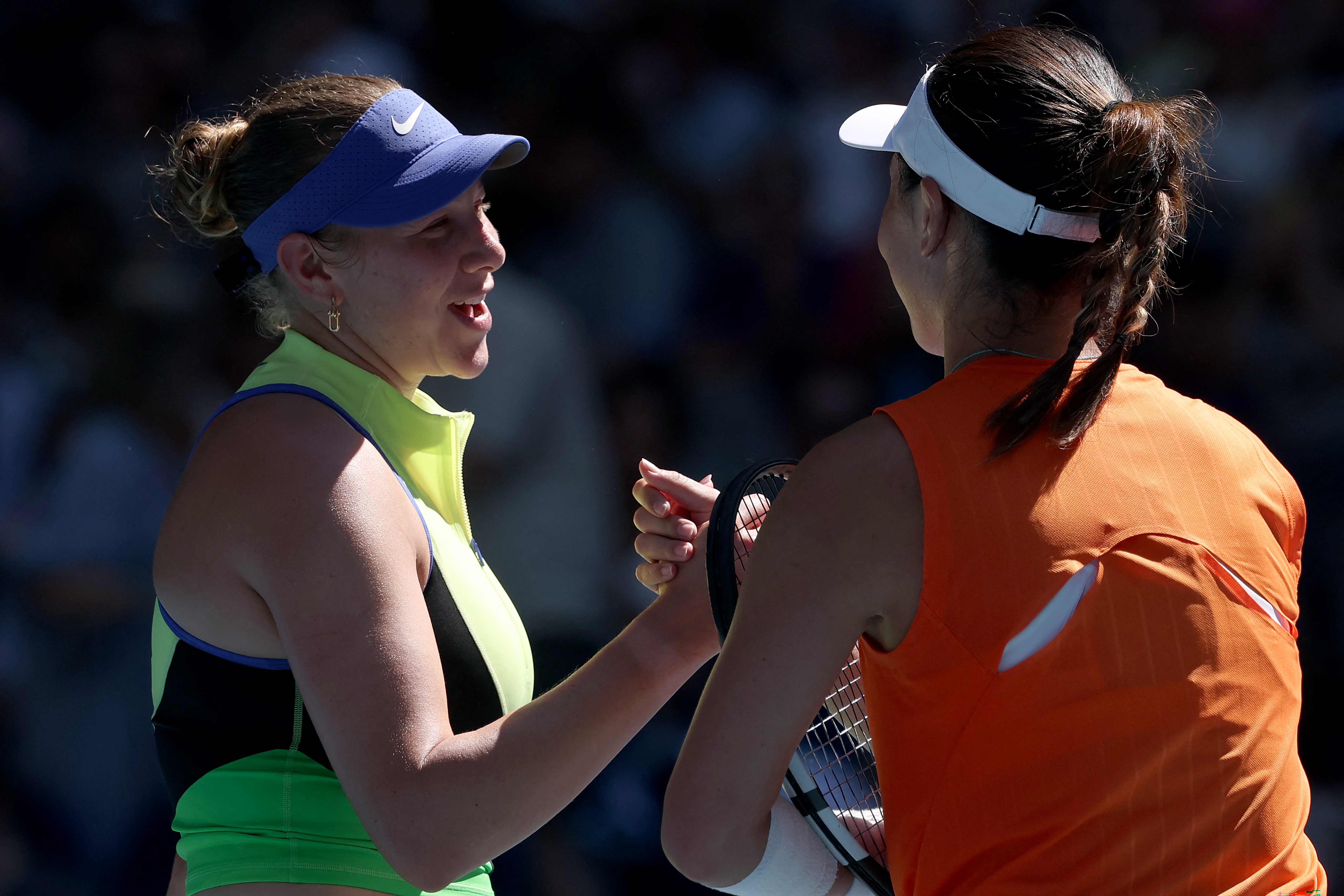 Amanda Anisimova (left) is through to the last eight