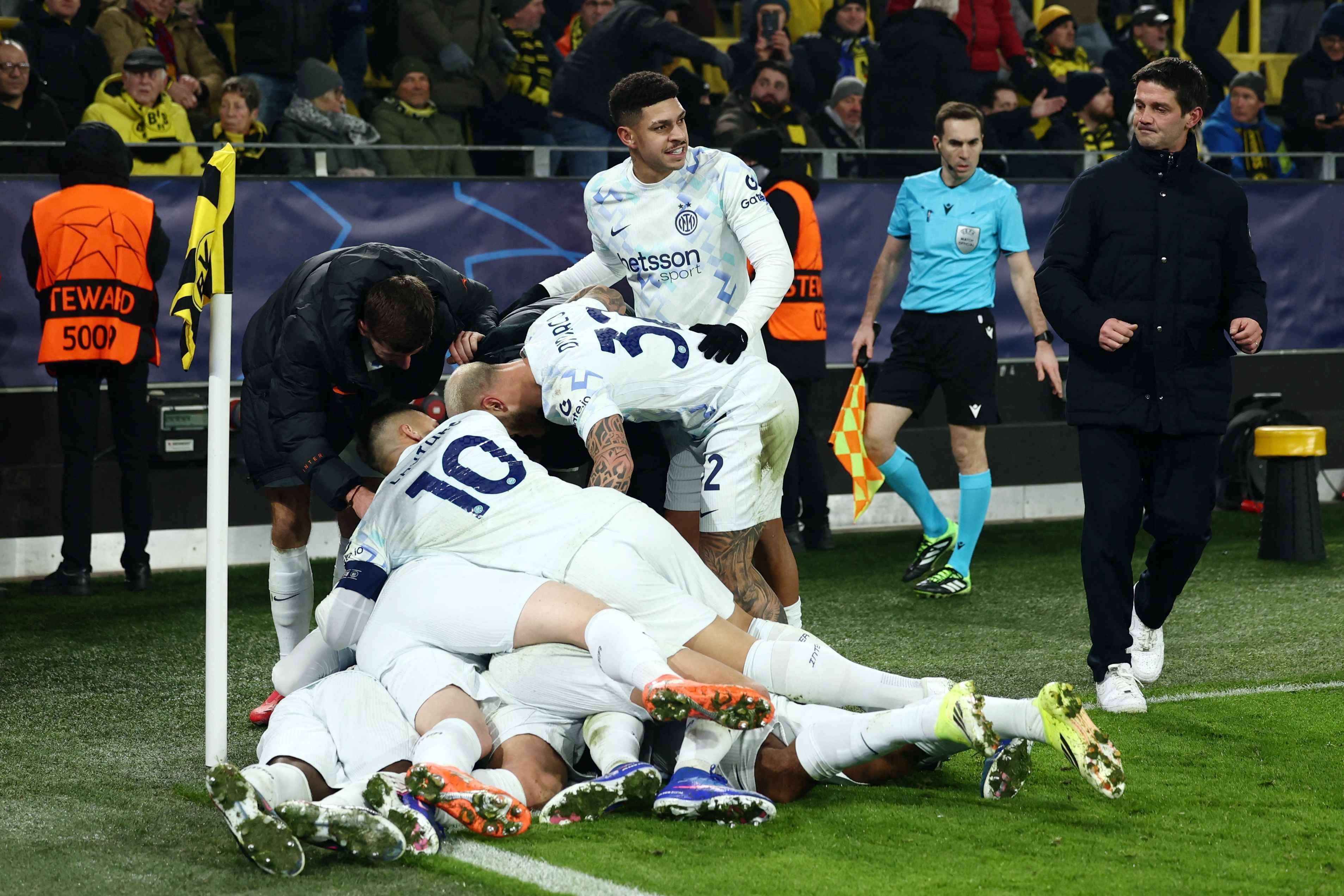 Andy Diouf is mobbed my his teammates after netting Inter's second