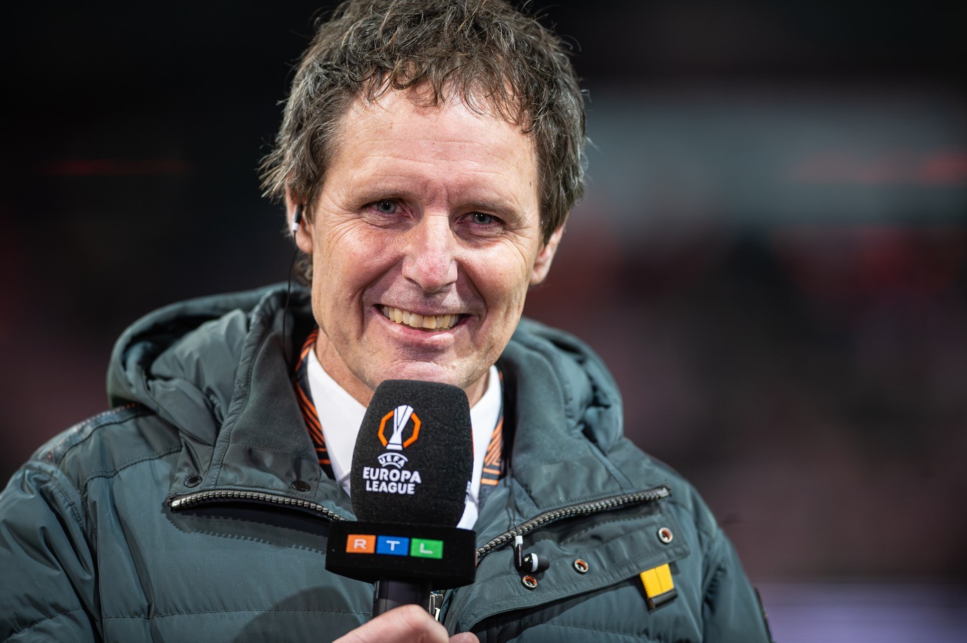 Flemming Povlsen helped clear the snow for Monday's crucial clash in Aarhus