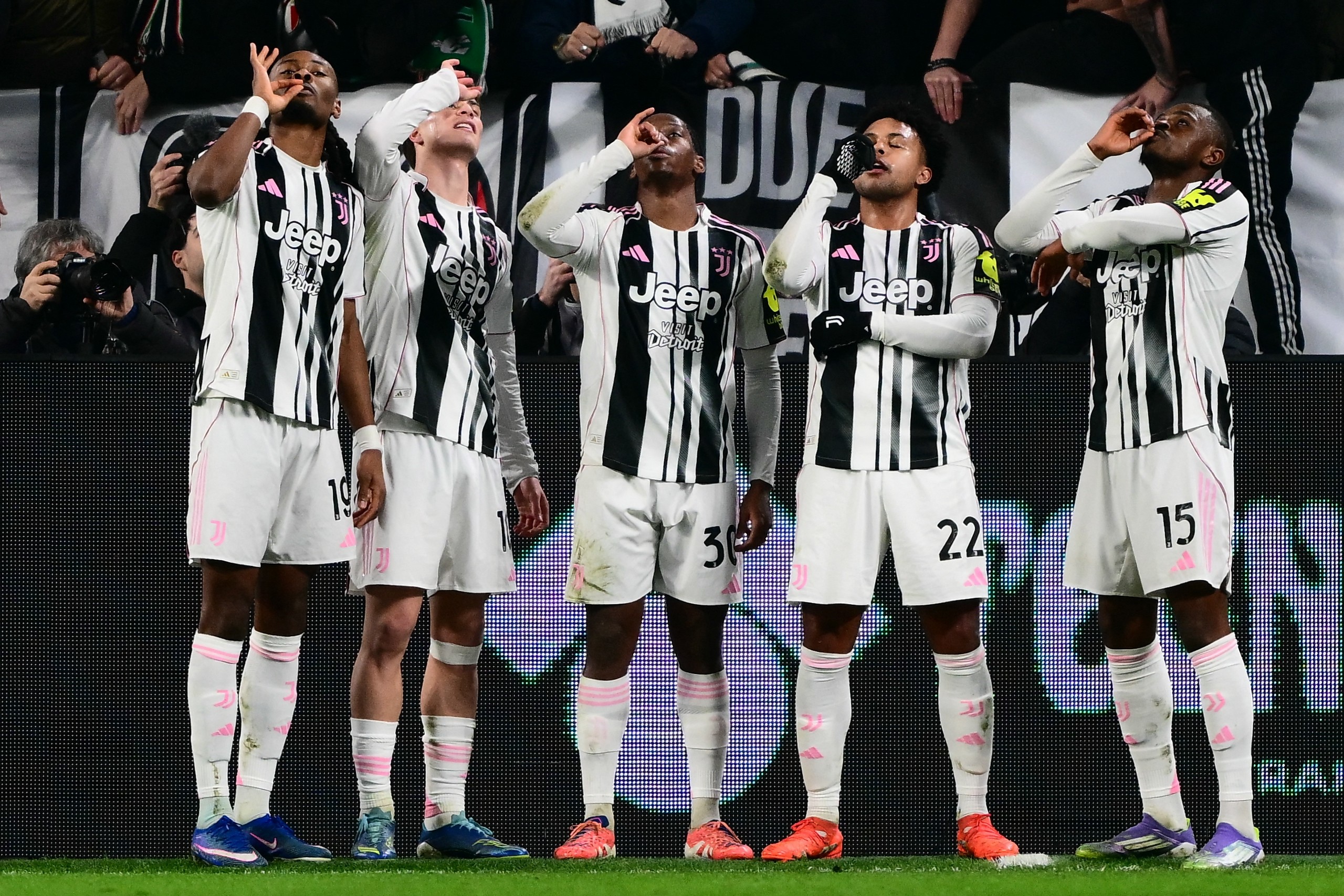 Juventus' players celebrate Jonathan David's opener