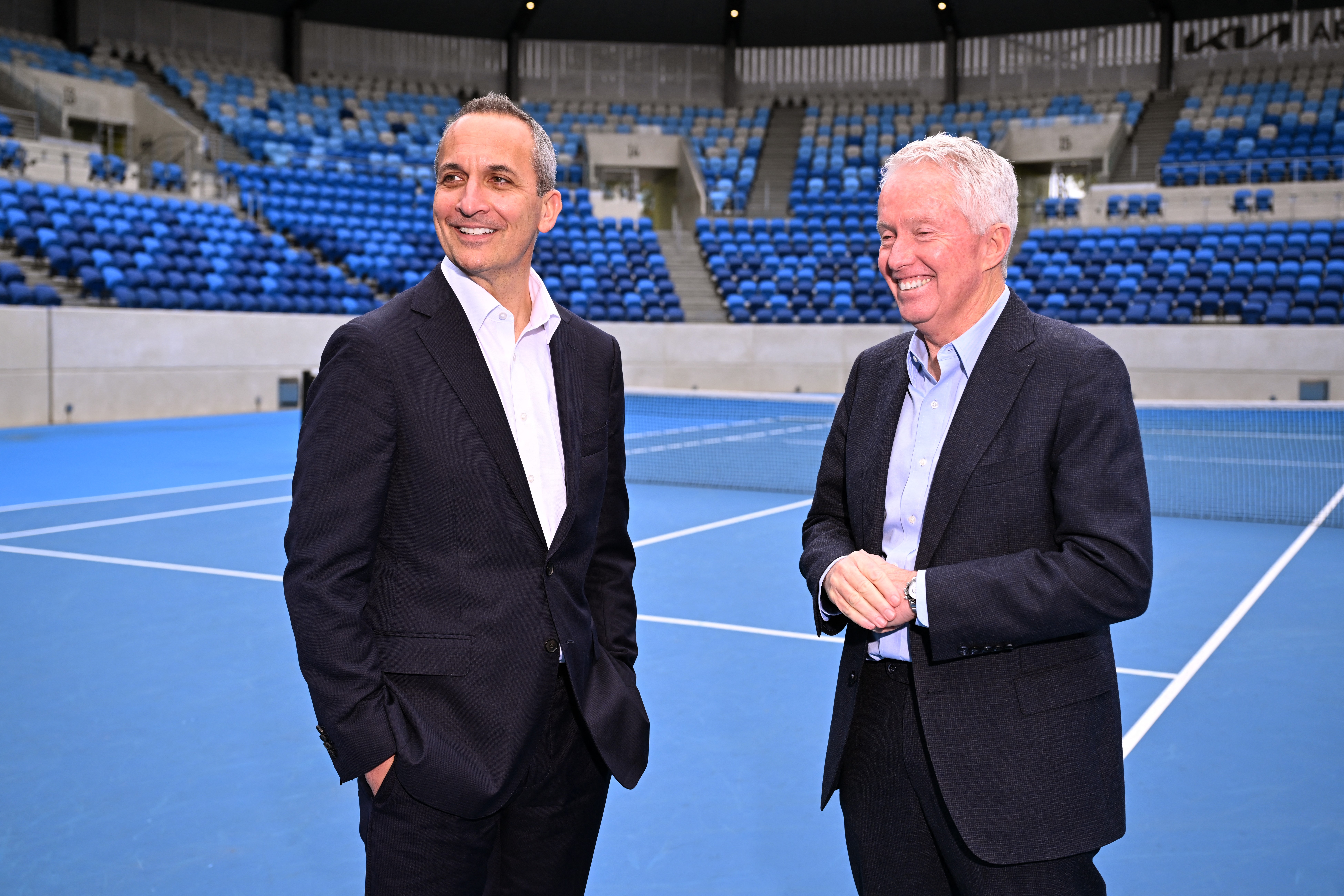Andrew Abdo (left) speaks with outgoing Tennis Australia CEO Craig Tiley.