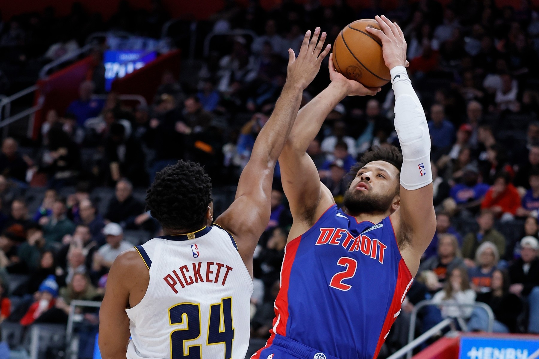 Detroit Pistons guard Cade Cunningham shoots over Nuggets guard Jalen Pickett
