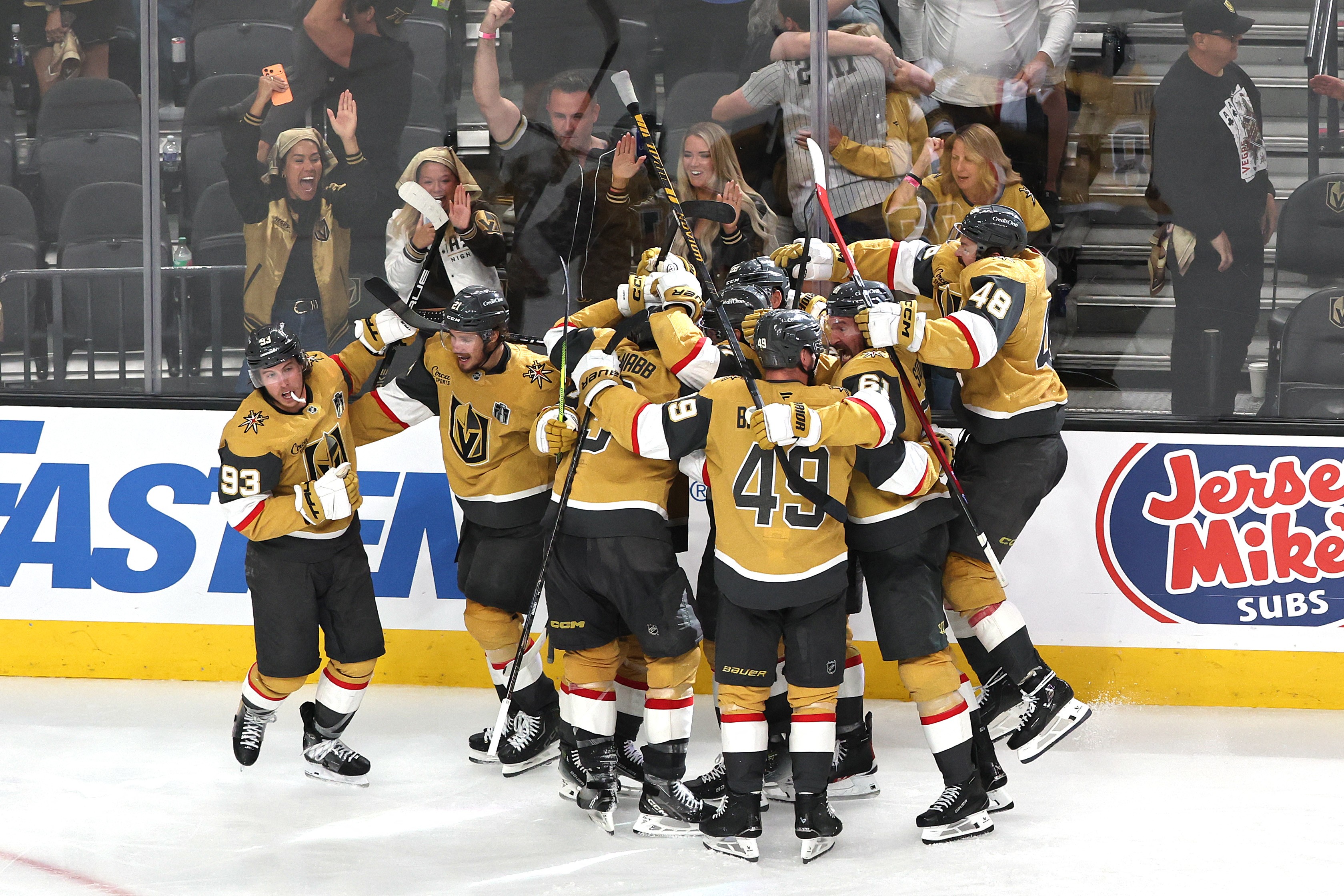The Vegas Golden Knights celebrate their overtime win over the Carolina Hurricanes