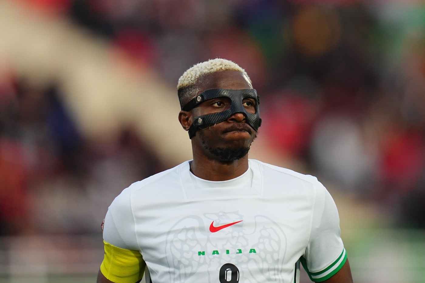 Victor Osimhen looks on