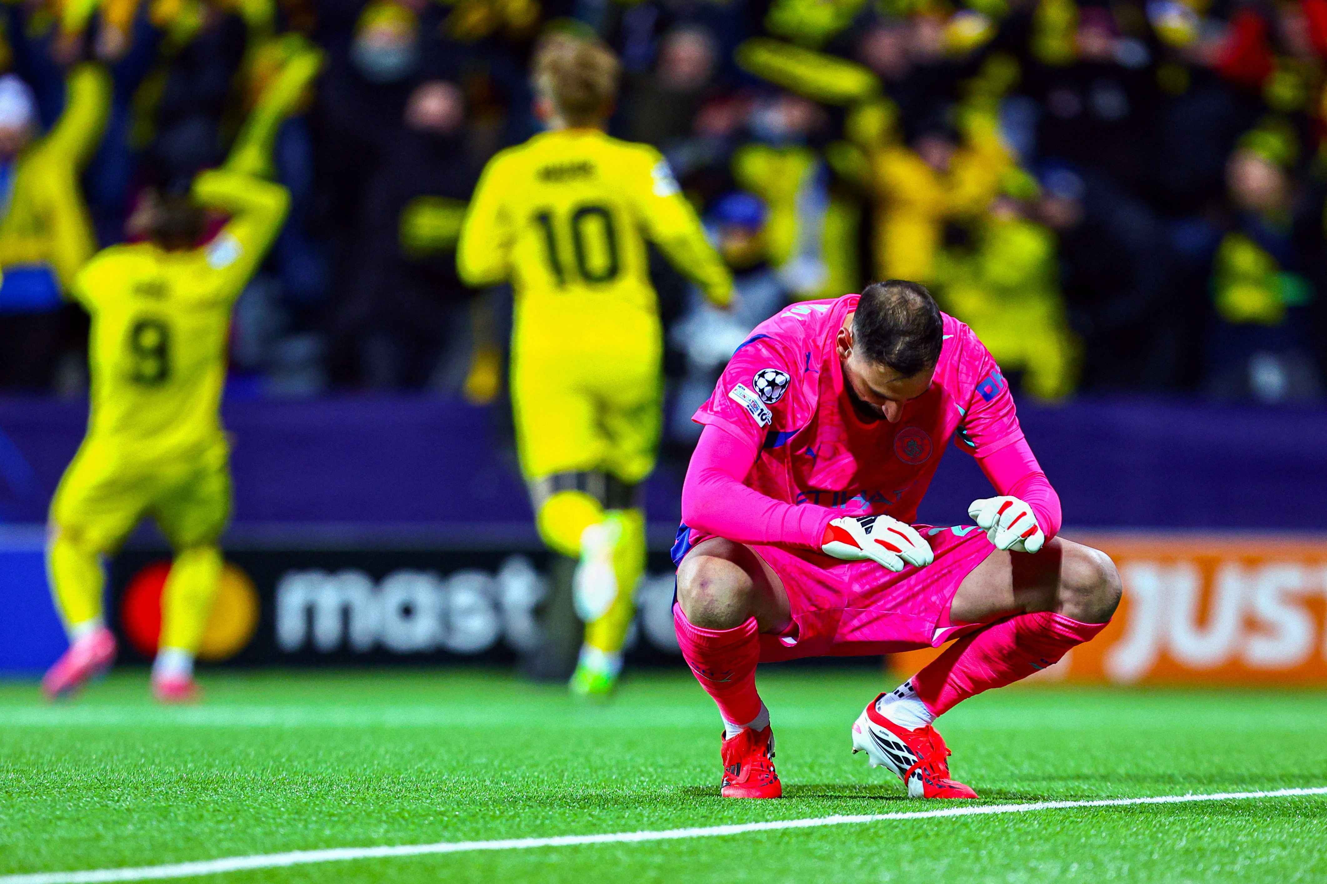 Manchester City's Gianluigi Donnarumma looks dejected after Bodo/Glimt's Kasper Hogh scores their second goal