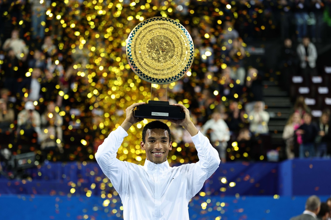 Felix Auger-Aliassime with his trophy