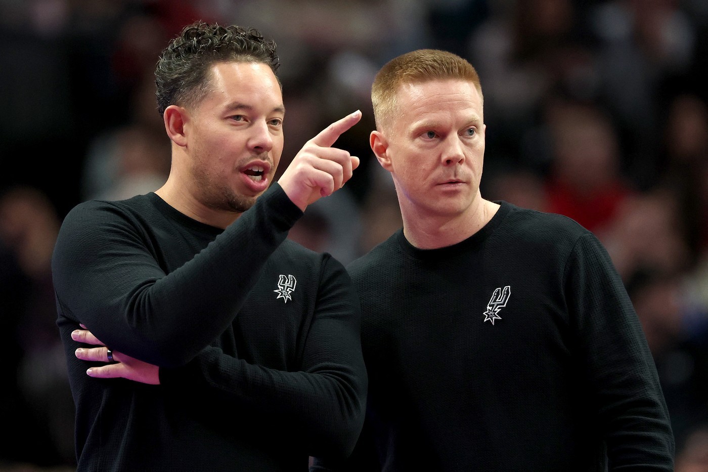 Spurs head coach Mitch Johnson and associate head coach Sean Sweeney (right)
