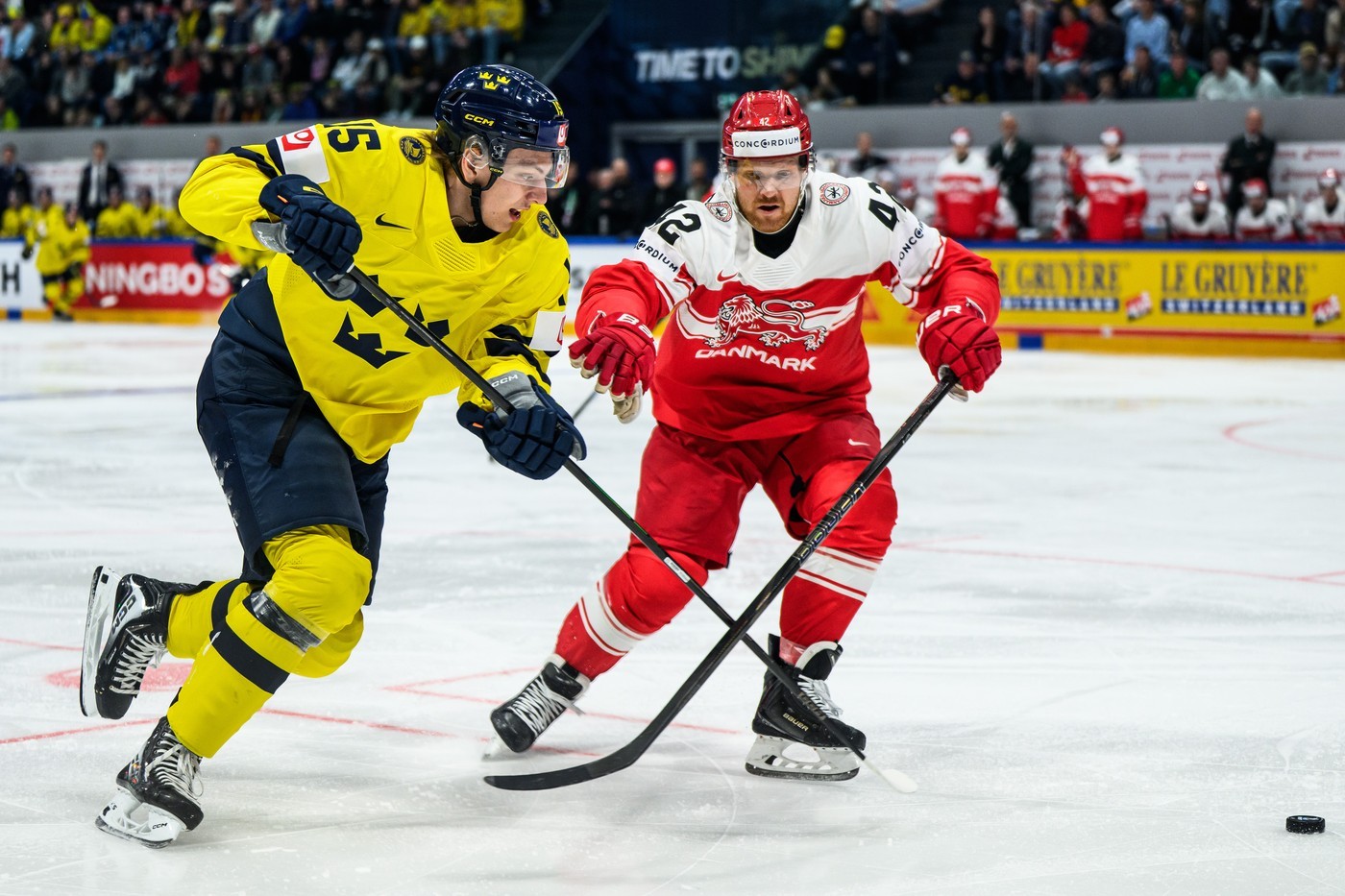 Jack Berglund of Sweden attempts to beat Phillip Bruggisser of Denmark
