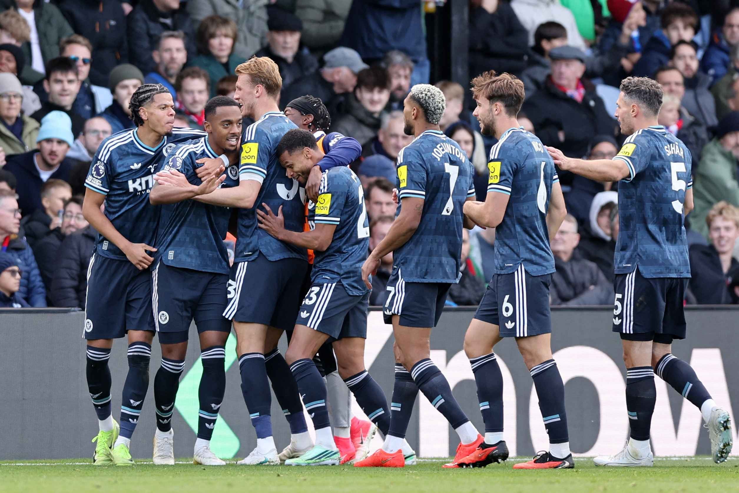 Newcastle's Joe Willock celebrates with his teammates