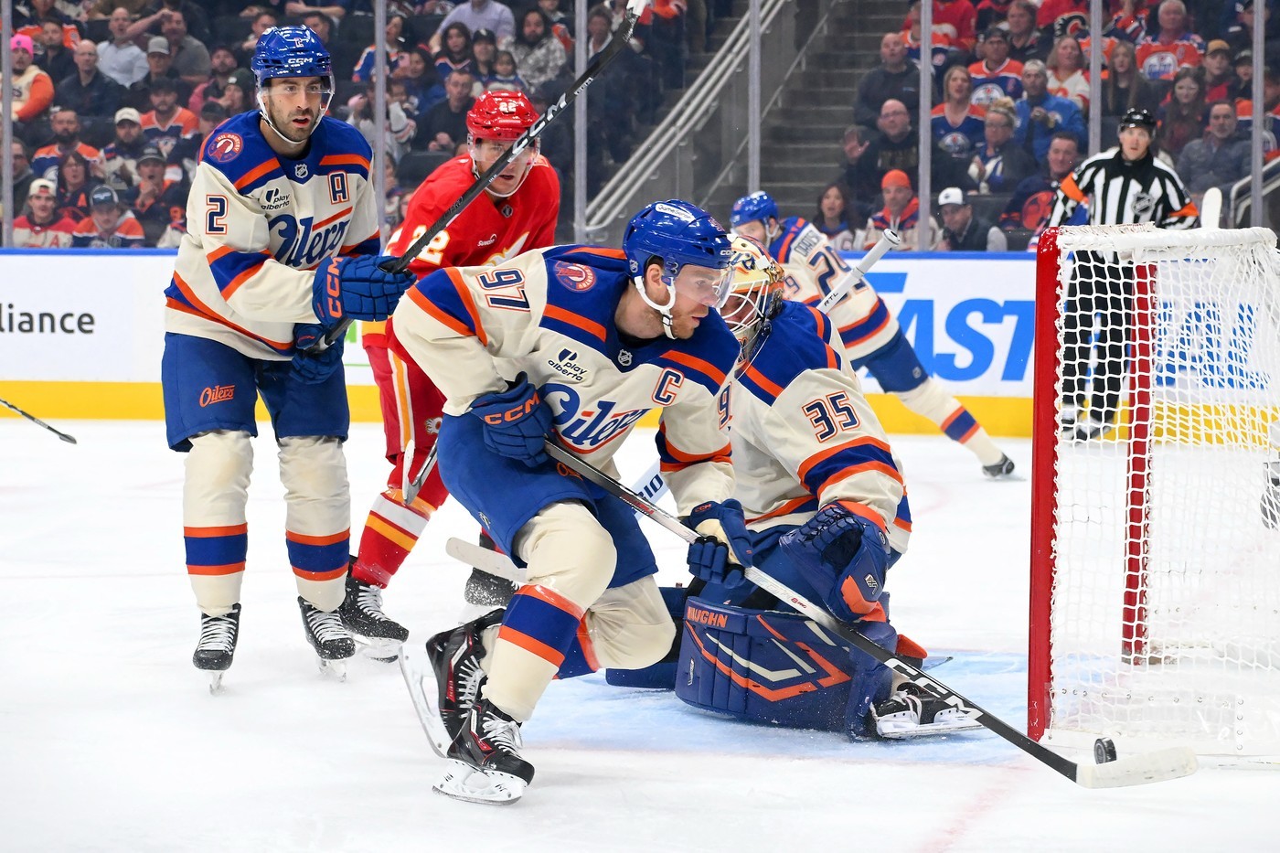Connor McDavid handles the puck during a game against the Calgary Flames (2026)