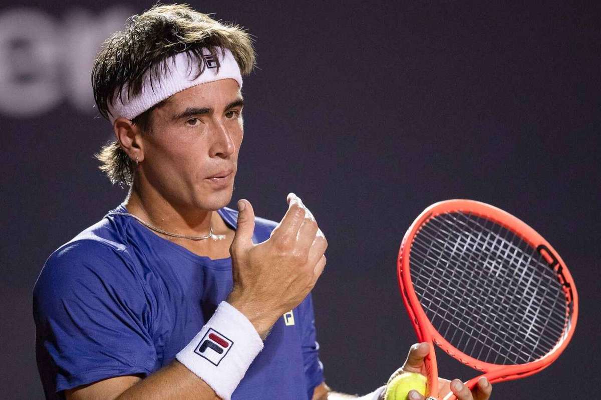 francisco comesana cigarette smoking a at Miami Open Francisco Comesana smoking a cigarette