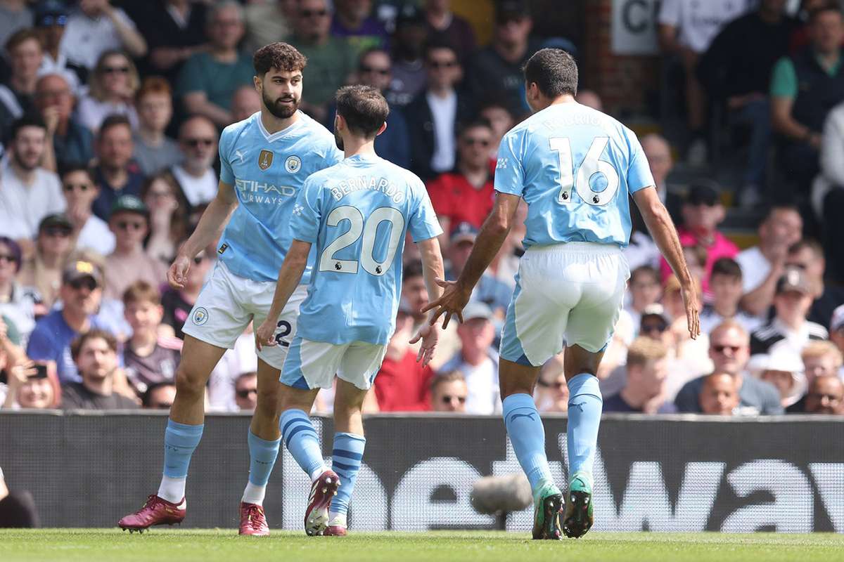 Manchester City leapfrog Arsenal at Premier League summit after Fulham ...