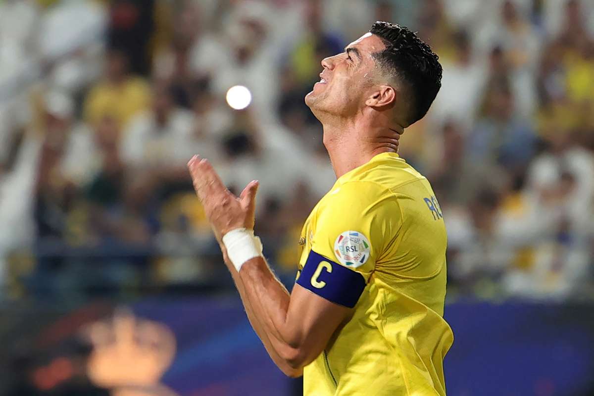 Cristiano Ronaldo Faces Possible Lashes in Iran for Hugging Artist ...