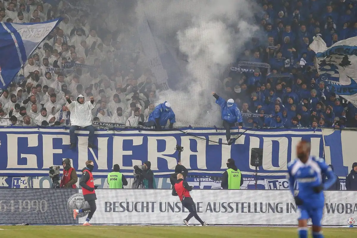 Aggressive fans during the Magdeburg - Dresden clash