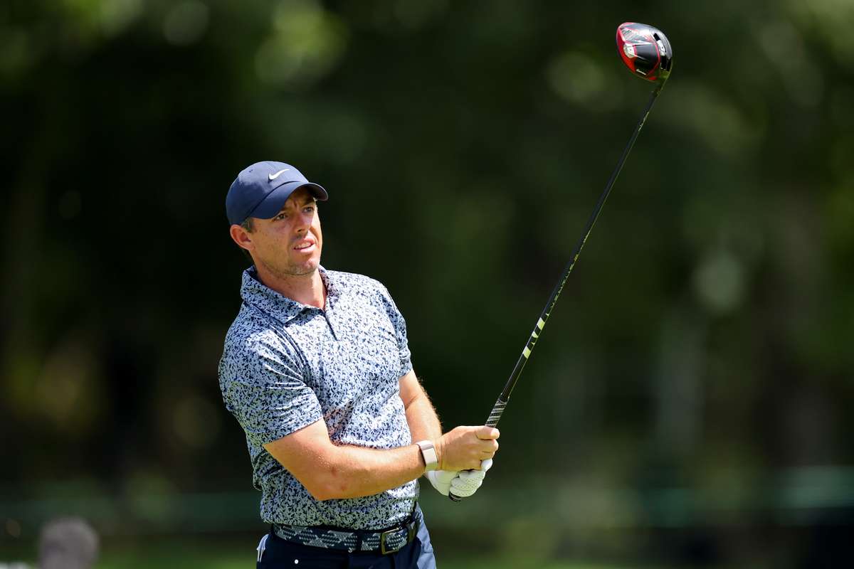 Rory McIlroy and Brian Harman share the lead at rain-hit BMW ...
