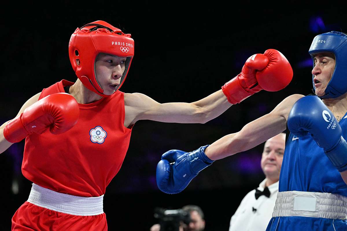 Taiwanese Boxer Lin Wins To Guarantee Olympic Medal After Gender Row ...