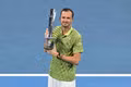Daniil Medvedev with the Brisbane trophy