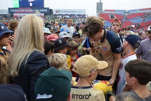 Round 15 Player of the Week Eli Adams gets amongst his young fans at McDonald Jones Stadium.