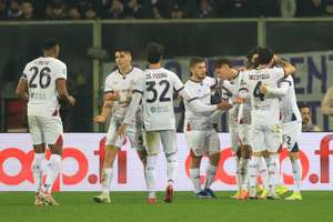  Marco Palestra celebrates with his Cagliari teammates after scoring a goal