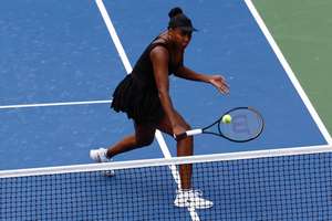 Venus Williams in doubles action at the 2025 US Open.